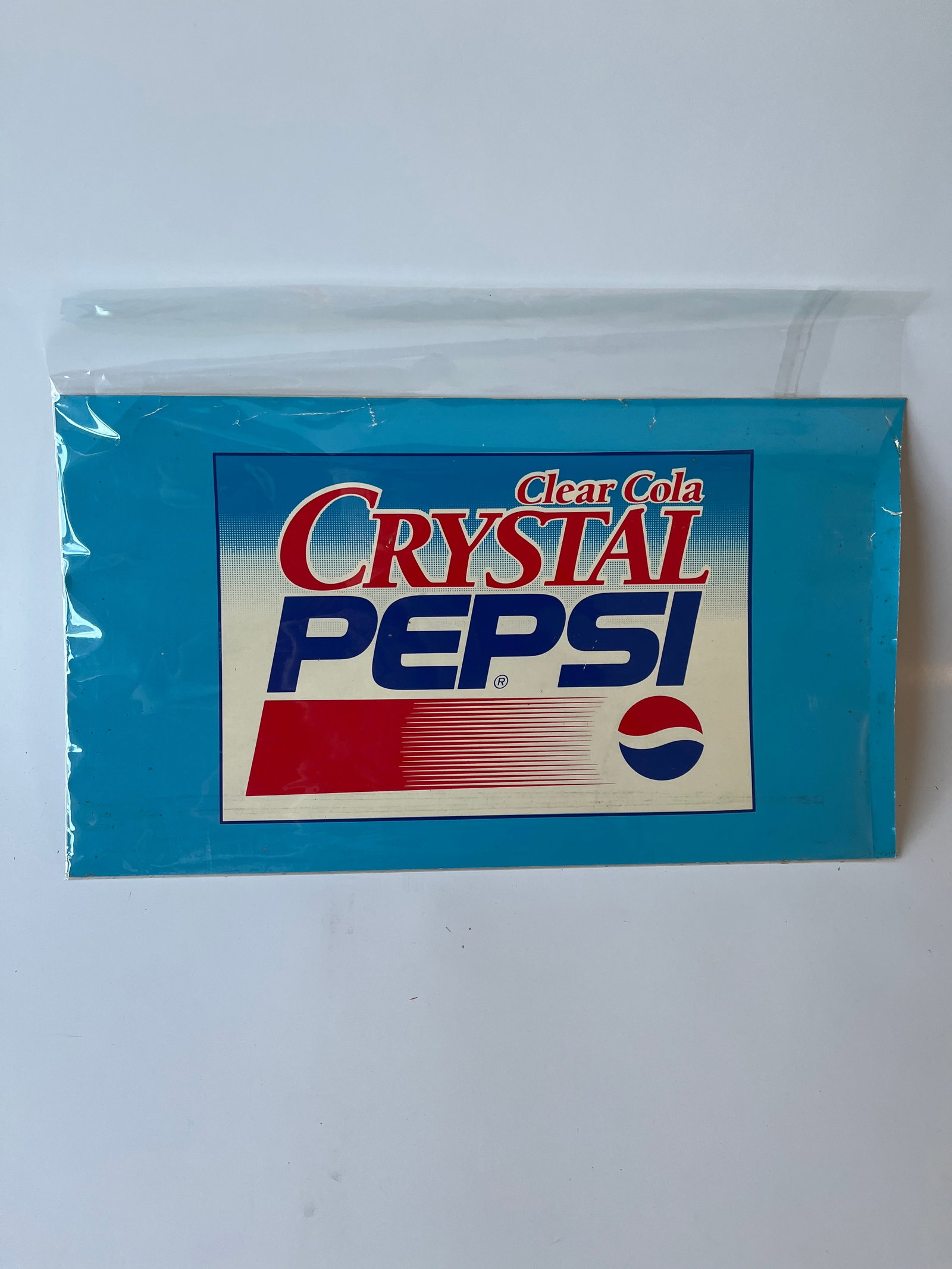 Crystal Pepsi Clear Cola paper stick on sign. 9" X 16".: Crystal Pepsi Clear Cola paper stick on sign. 9" X 16".