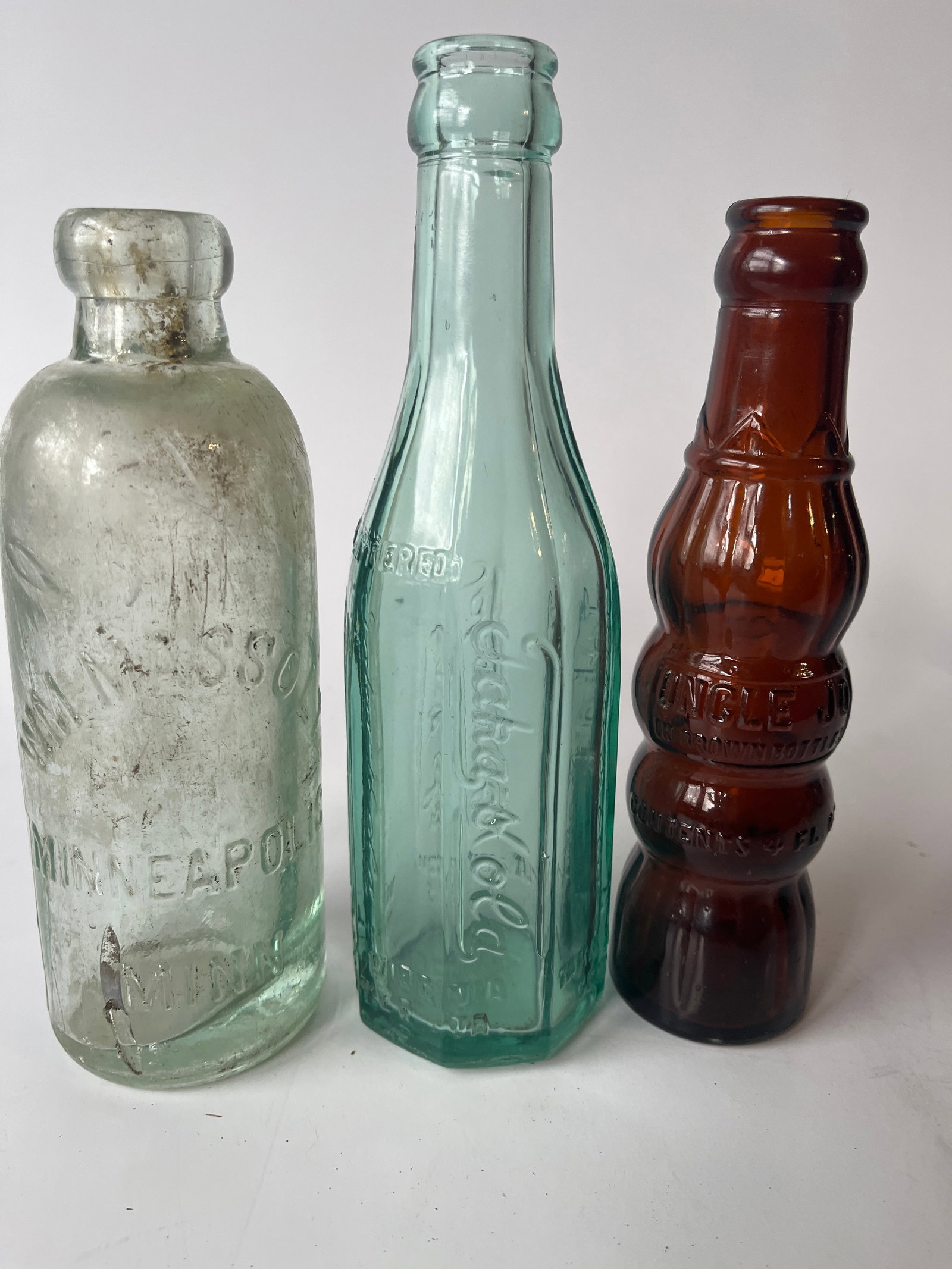 Lot of 3 sodas. A Minn. hutch, a Va. Taka-Kola and an Uncle Joe.: Lot of 3 sodas. A Minn. hutch, a Va. Taka-Kola and an Uncle Joe. Hutch is stained, other 2 perfect.