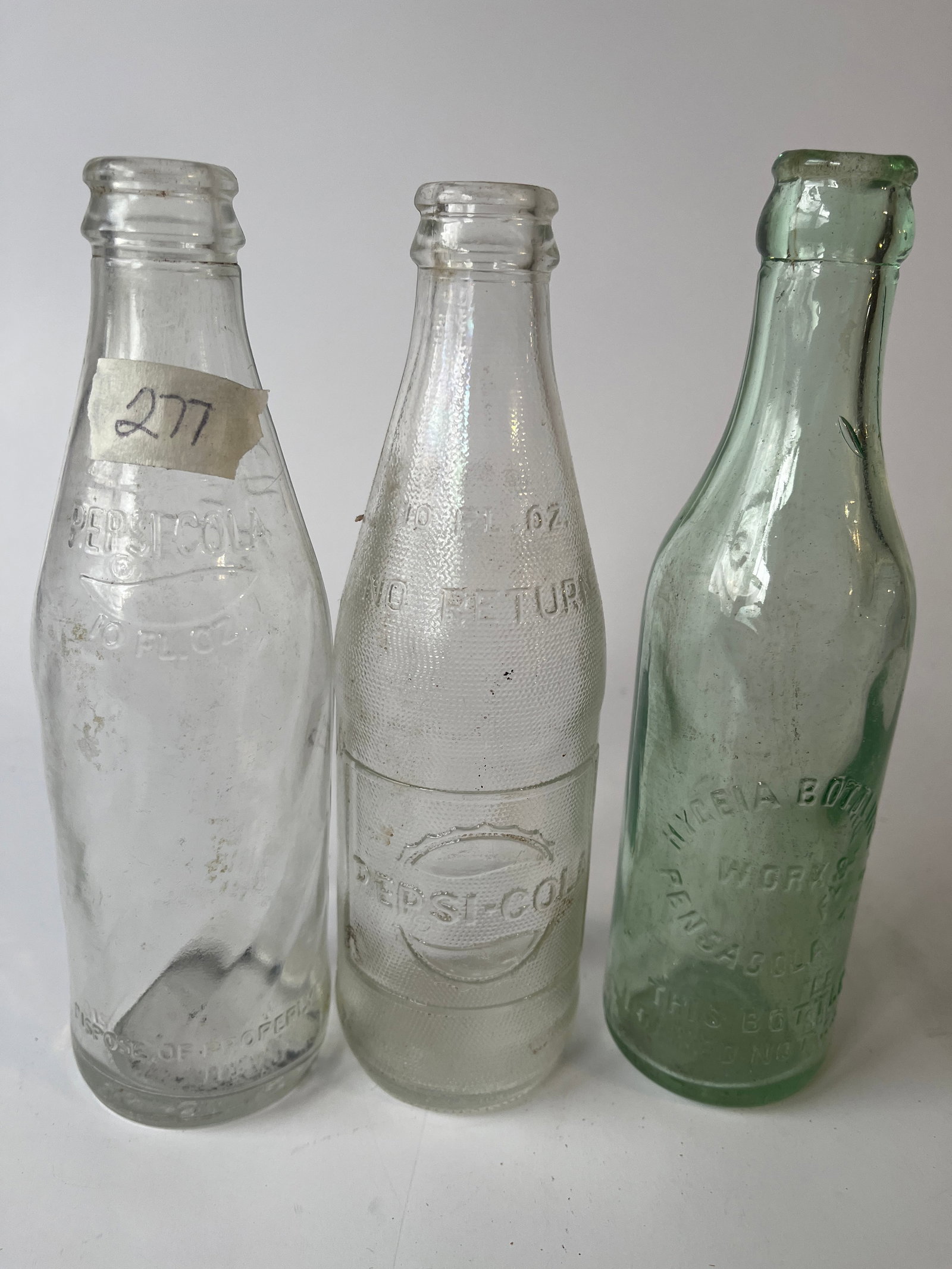 Lot of 2 different No Return Pepsi bottles and a Pensacola, Fla soda bottle.: Lot of 2 different No Return Pepsi bottles and a Pensacola, Fla soda bottle. No damage.