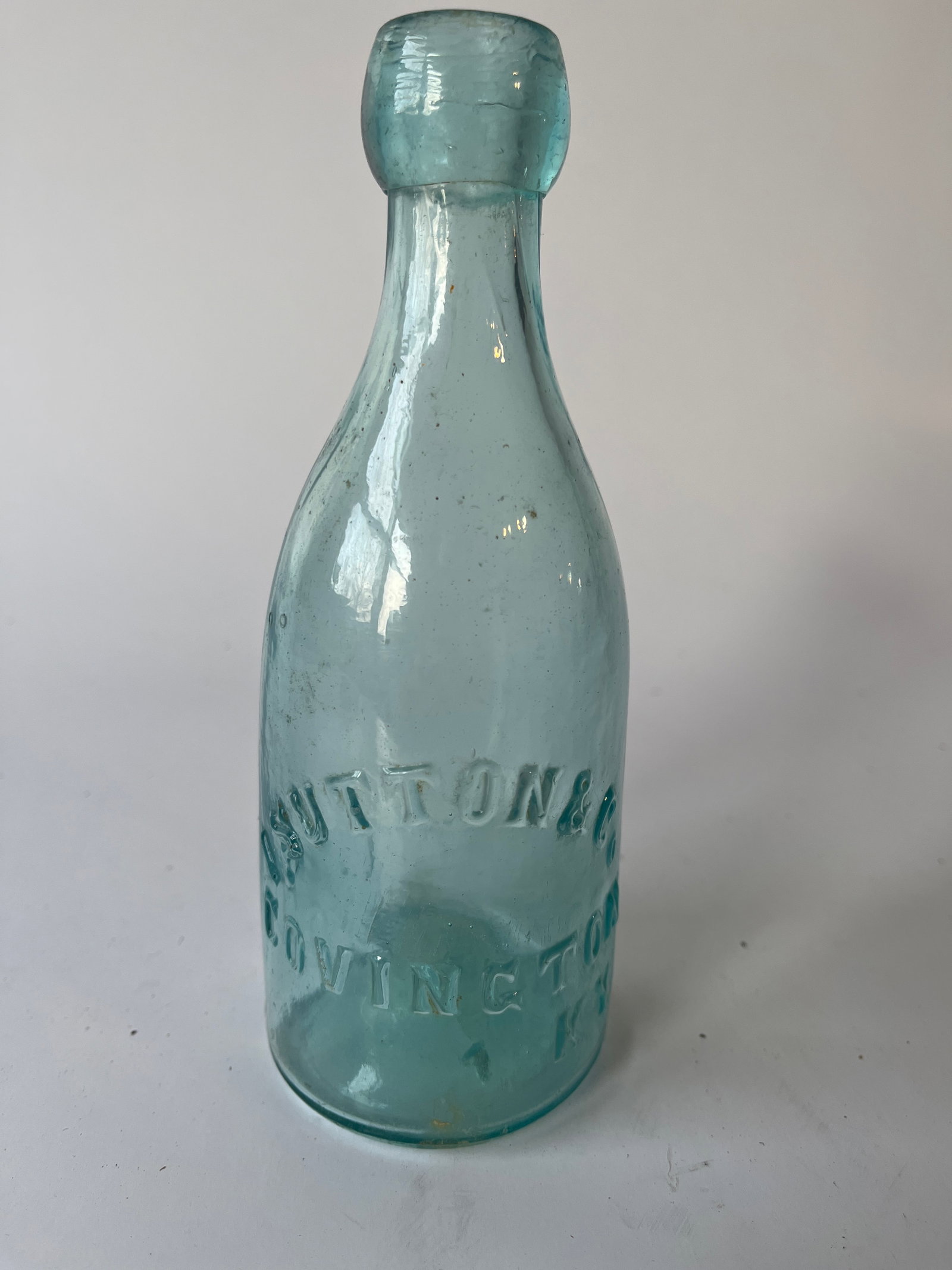 I. Sutton & Co. Covington KY iron pontil soda.: I. Sutton & Co. Covington KY iron pontil soda. Light haze, no damage.