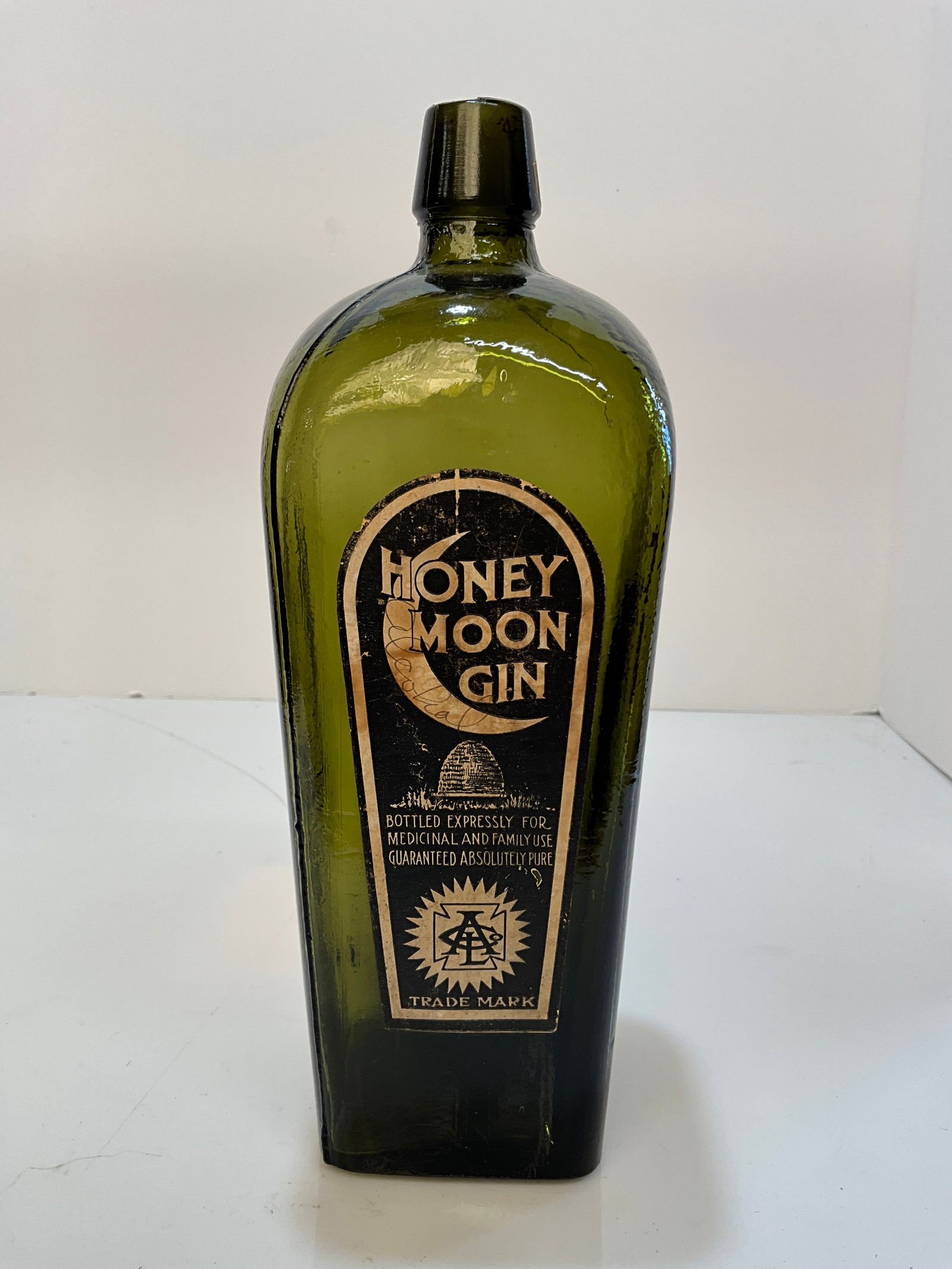 Honey Moon Gin Bottle, Machine made Deep Green with full label, 1918 War Revenue Act bottle (1 of 7)