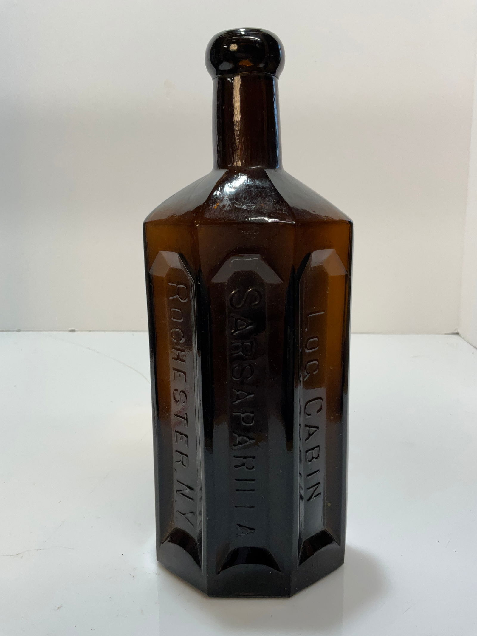 Warner's Log Cabin Sarsaparilla, Rochester, N.Y. 9" tall. (1 of 8)