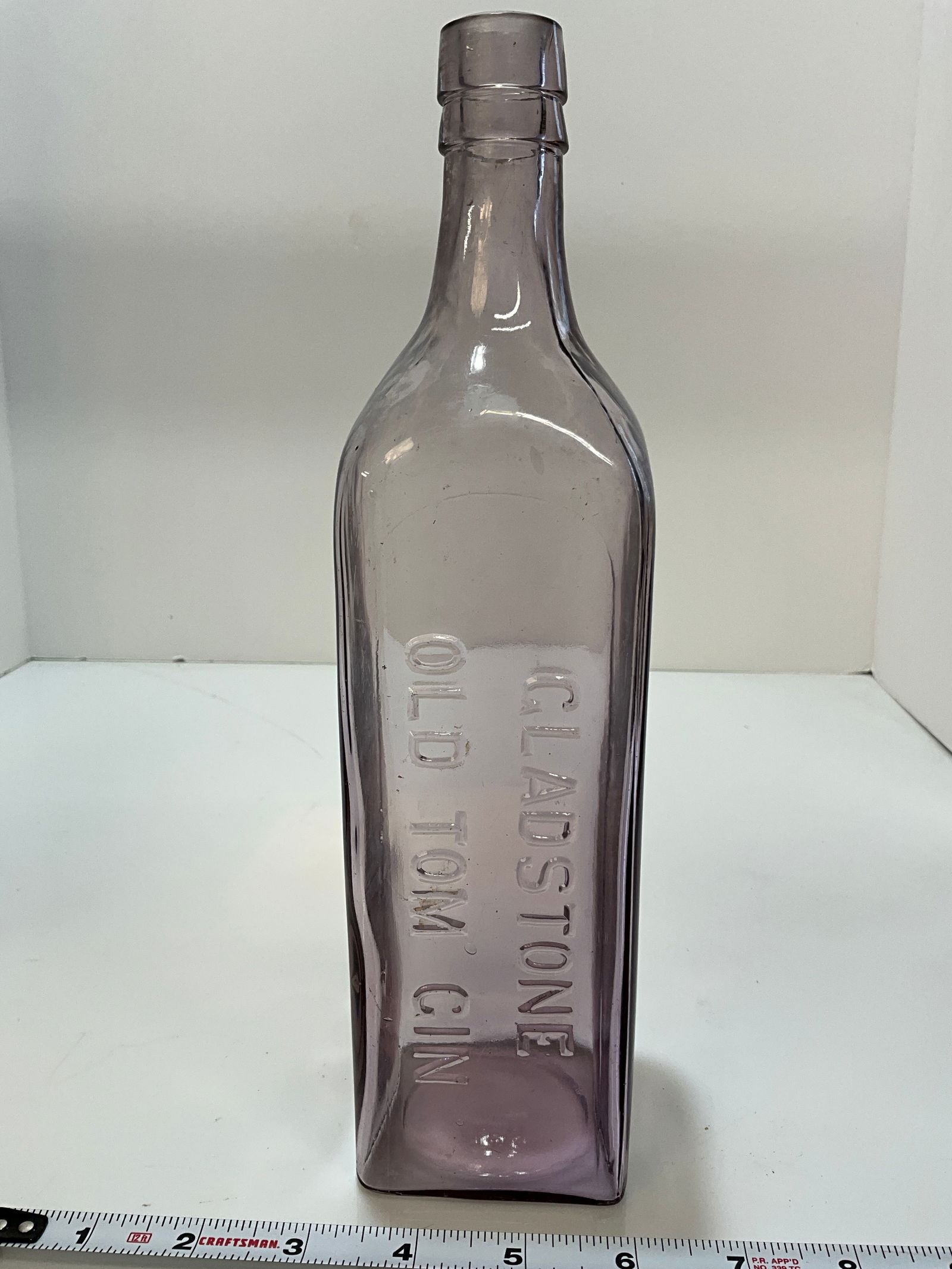 Gladstone, Old Tom Gin, Bottle, 11 " tall. Amethyst Color of Glass (1 of 5)
