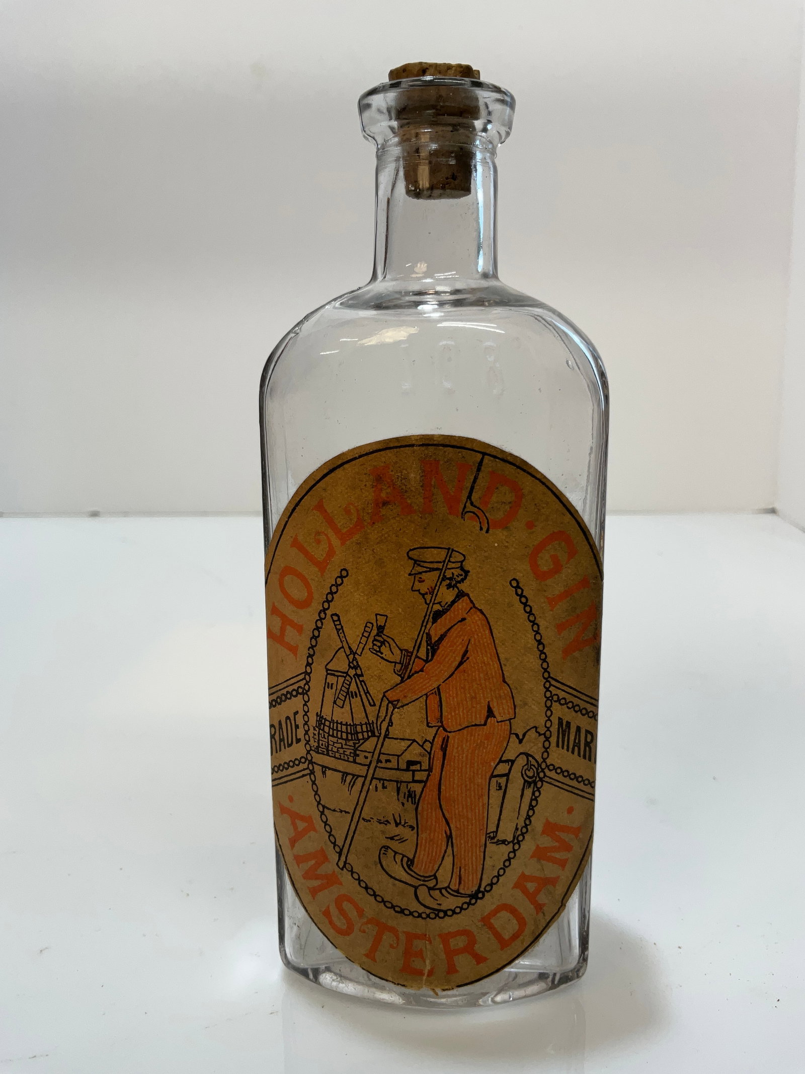 Holland Gin Bottle, Amsterdam. Clear with a Full Label: Holland Gin Bottle, Amsterdam. Clear with a Full Label. Machine made bottle with no damage. Label is complete. 8 oz. Bottle