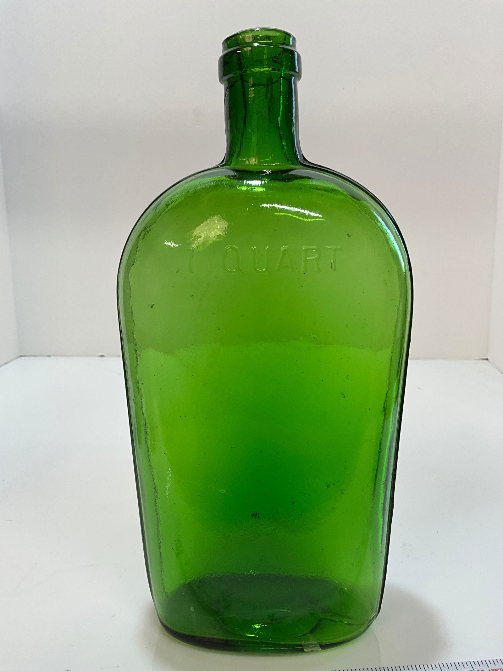 7UP Green Strap Sided Quart Flask, with Tooled Lip, Embossed with "1 Quart" on upper front. (1 of 8)