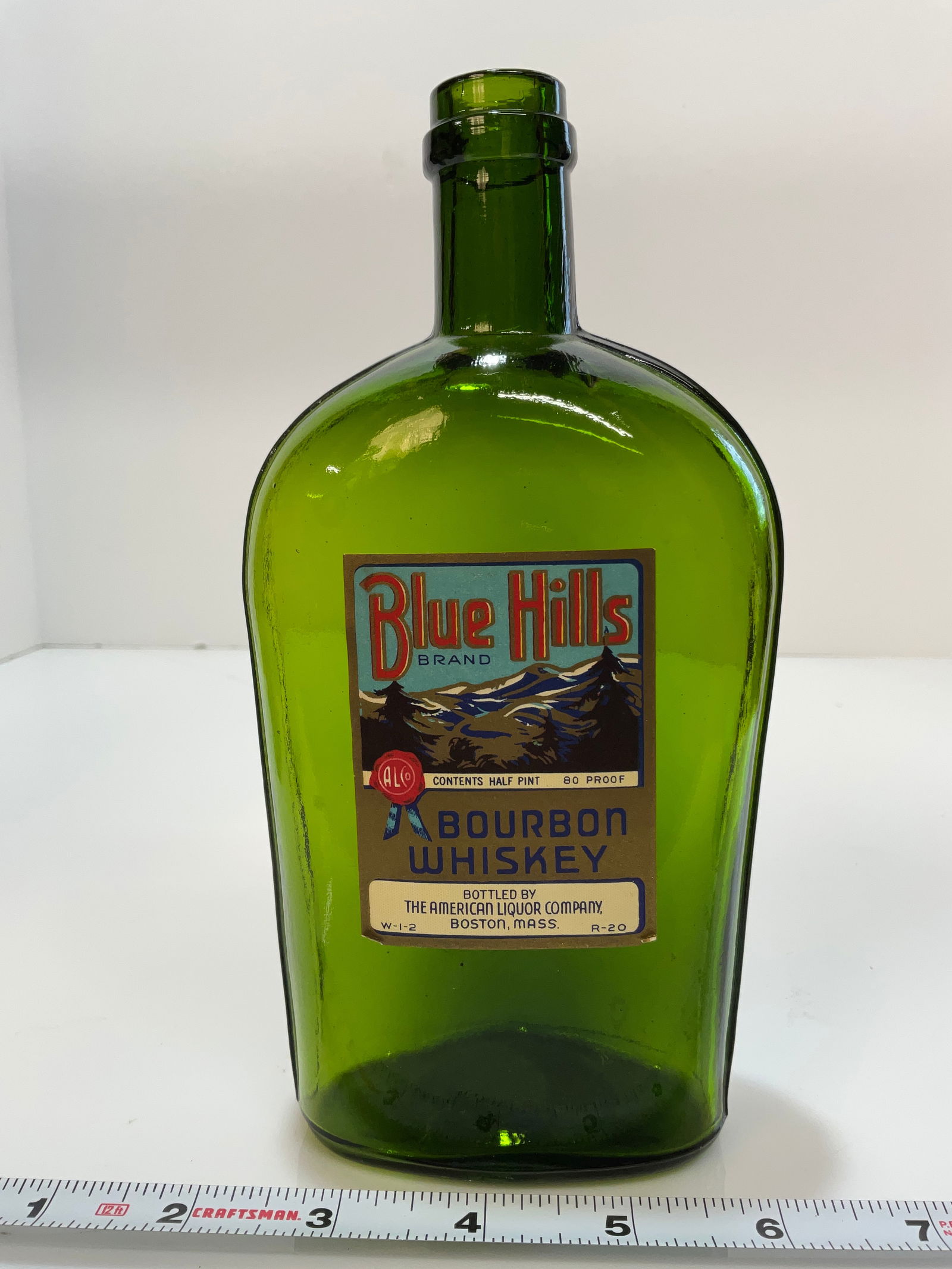 Forrest Green Strap Sided Pint Flask, with Tooled Lip, Embossed with "S.S.P." on base (1 of 7)