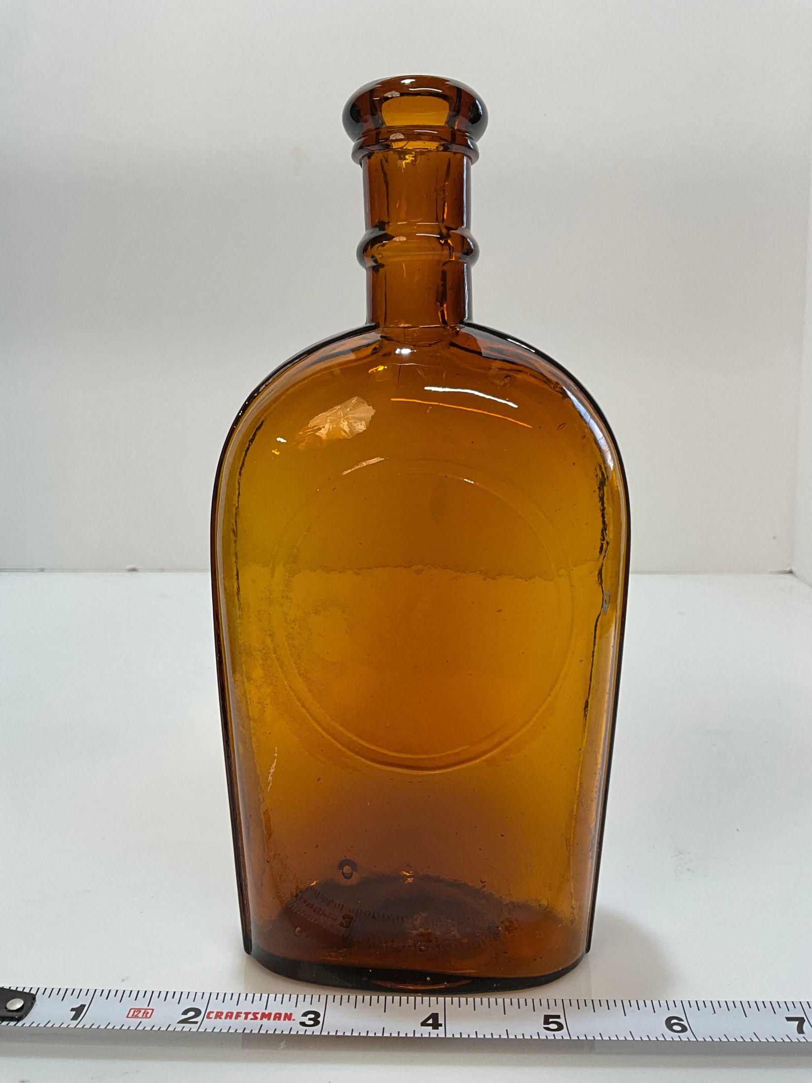 Early Pint Amber Flask, Applied Lip with an Embossed Double banded Slug Plate (1 of 6)