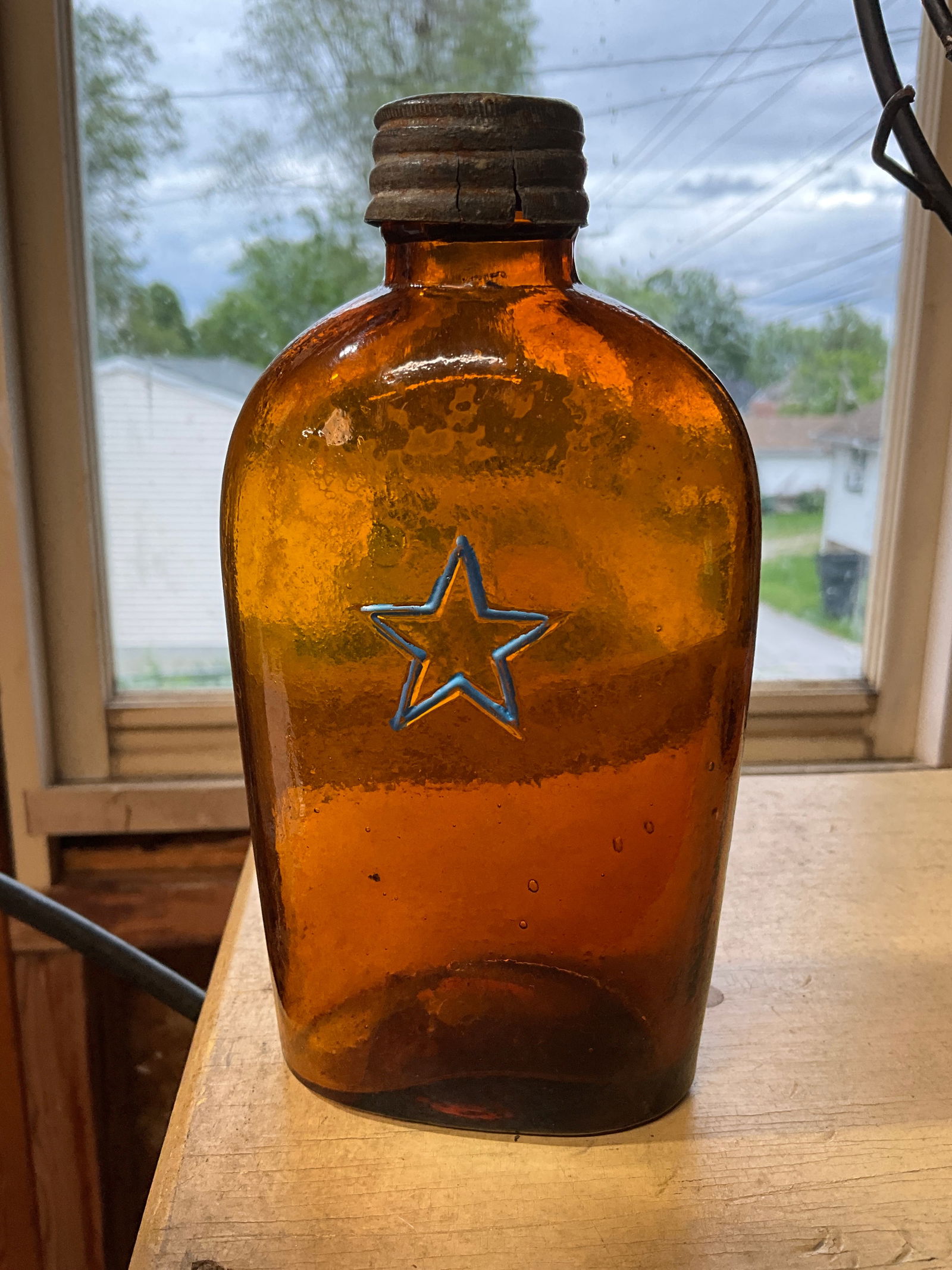 Amber 1/2 Pint Flask with an Embossed Star Early Screw Cap with Ground lip & Pewter Cap, Hinge Mold (1 of 6)