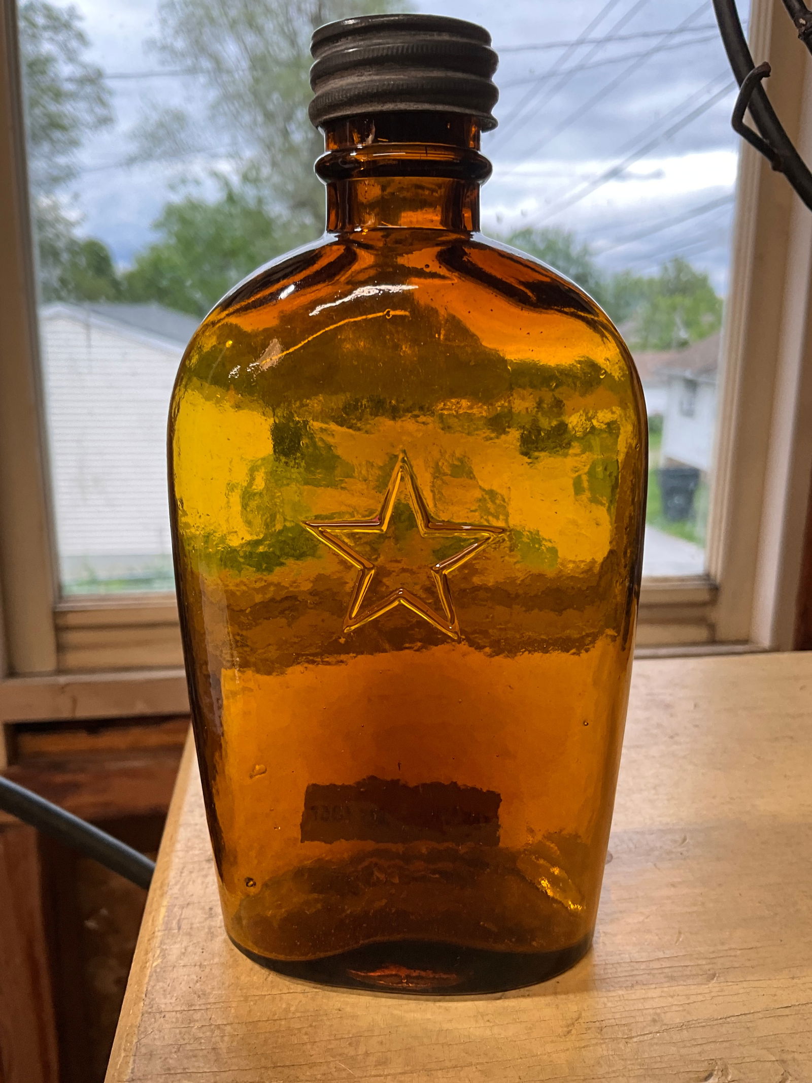 Amber 1/2 Pint Flask with an Embossed Star Early Screw Cap with Ground lip & Pewter Cap, Hinge Mold (1 of 7)