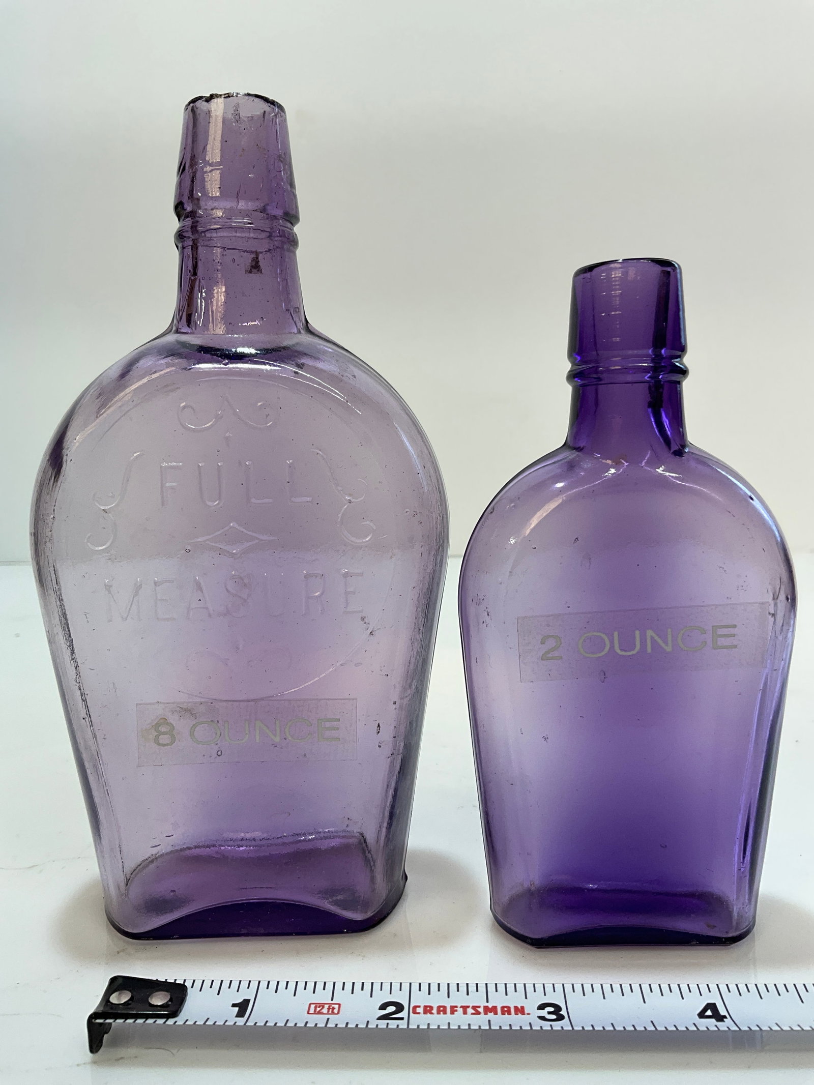 Two - 1/2 Pint and 1/8 Pint Purple Shoe Fly Flasks (1 of 5)