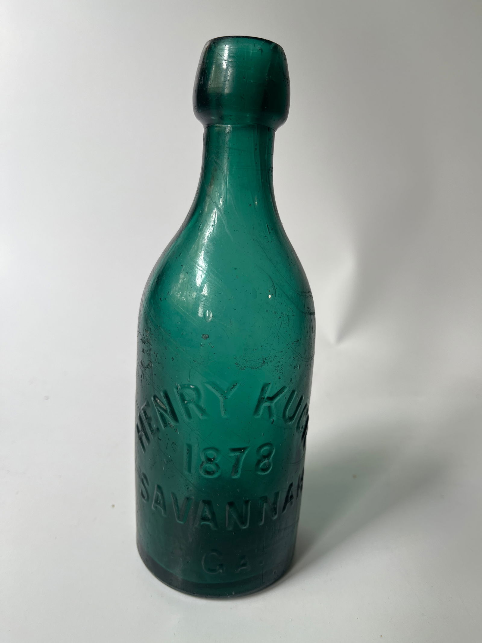Henry Kuck 1878 Savannah Ga green blob soda.: Here's a Henry Kuck 1878 Savannah Ga blob soda. The bottle is green in color and has no damage. There is a little internal stain and some ground etching on the exterior.