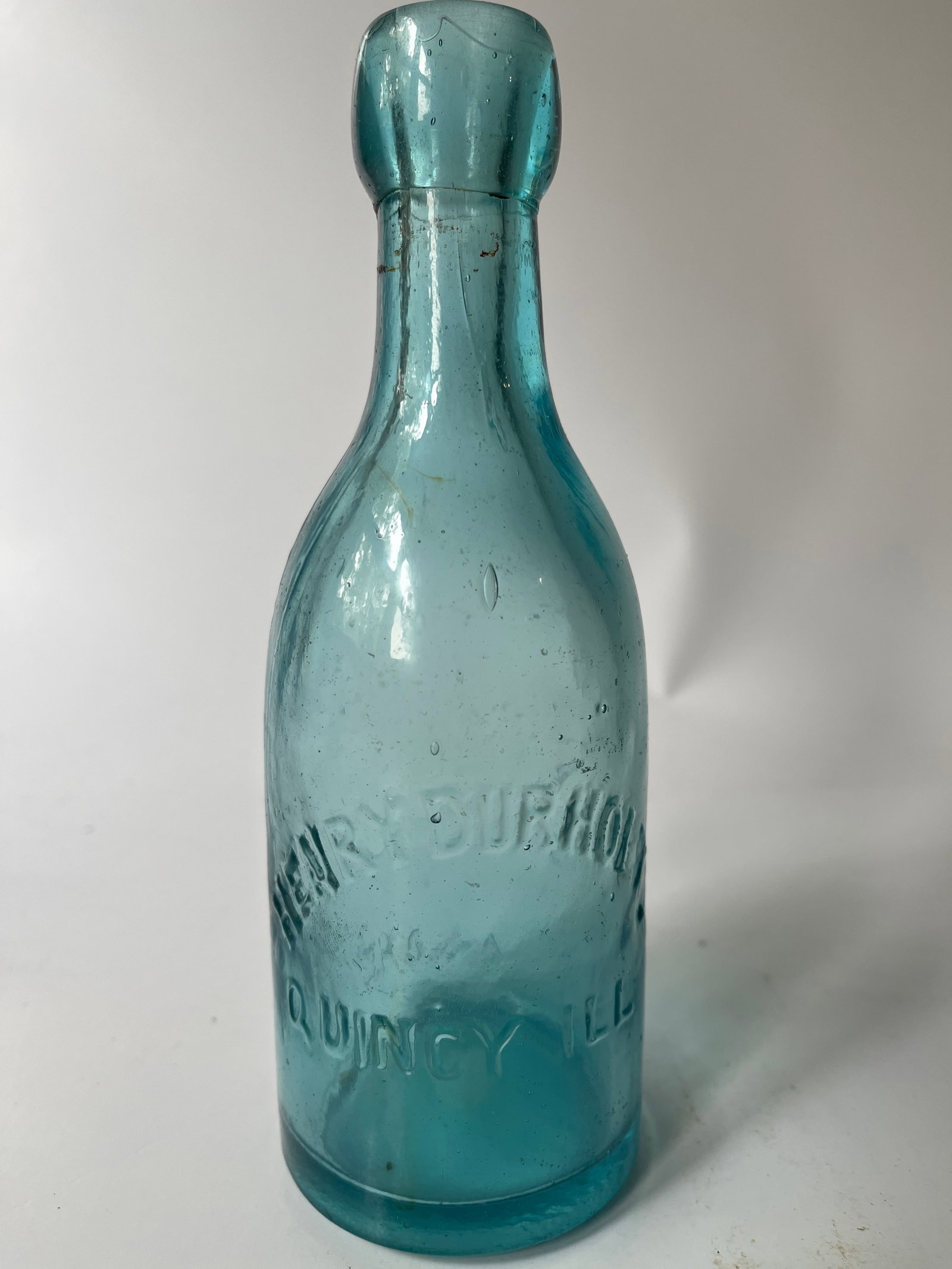 Henry Durholt Quincy Ill aqua blob soda.: Here is a Henry Durholt Quincy Ill blob soda. The soda is aqua in color and has no damage or stain.