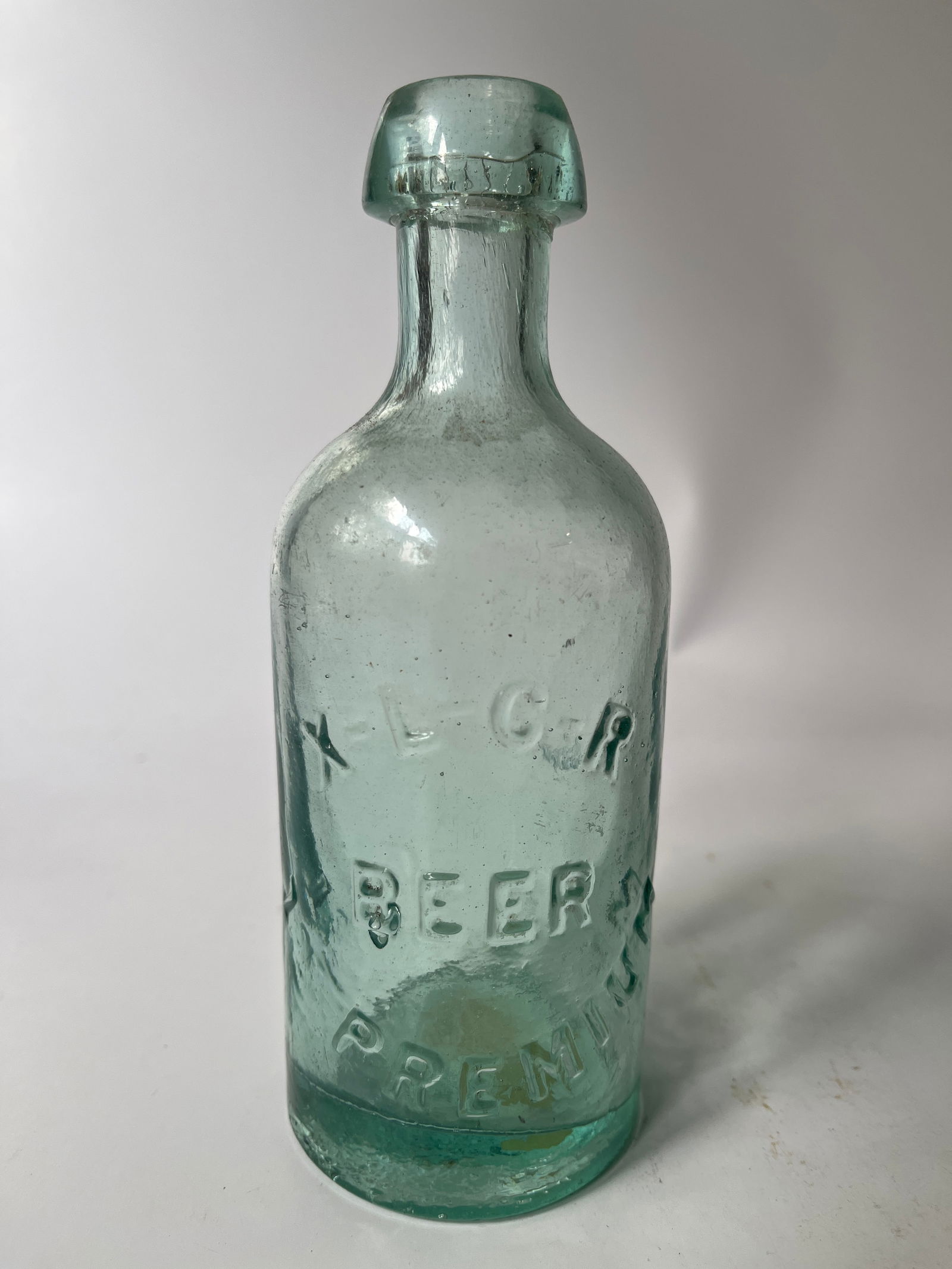 X-L-C-R Beer 1st Premium squat blob beer. (1 of 4)