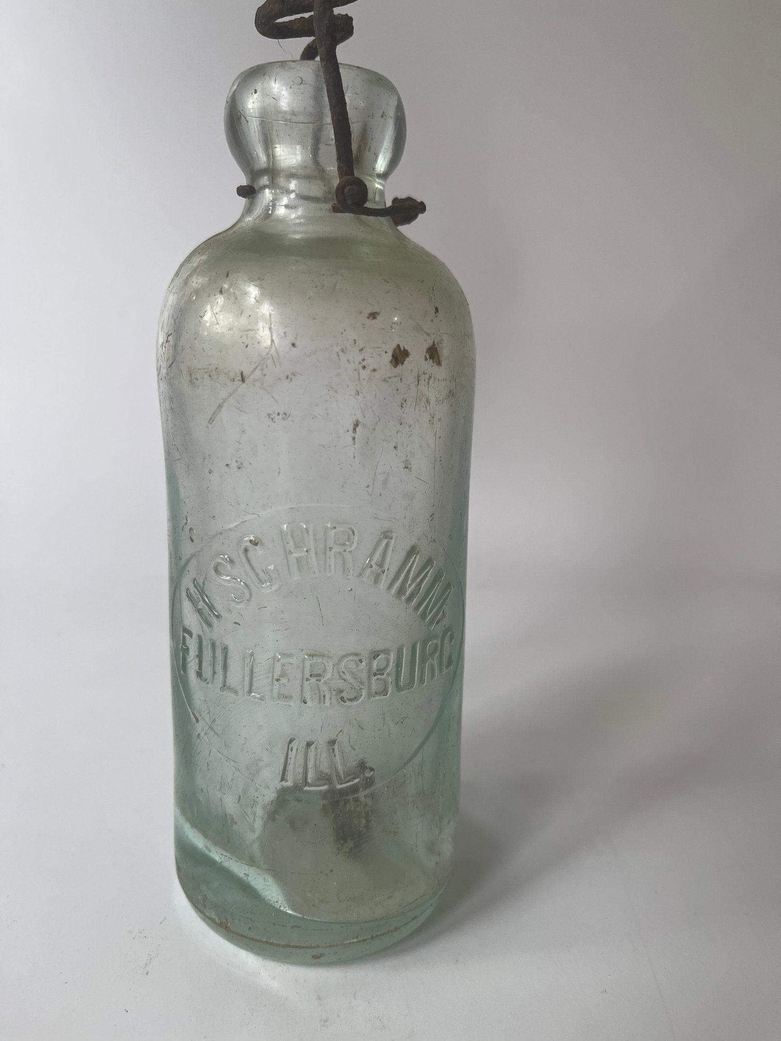H. Schramm Fullersburg, Ill aqua hutch soda: Here's a H. Schramm Fullersburg, Ill hutch soda. The bottle is aqua and has no damage There is some light stain.