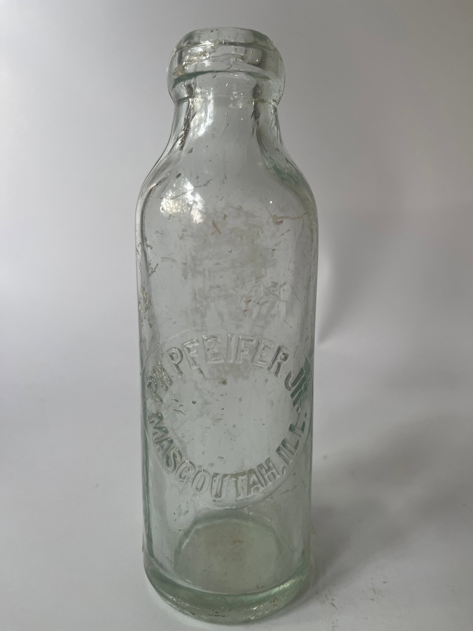 PH Pfeifer Jr. Mascoutah, Ill.: Here's another PH Pfeifer Jr. Mascoutah, Ill hutch soda. The bottle has an odd blob top and no damage or stain.