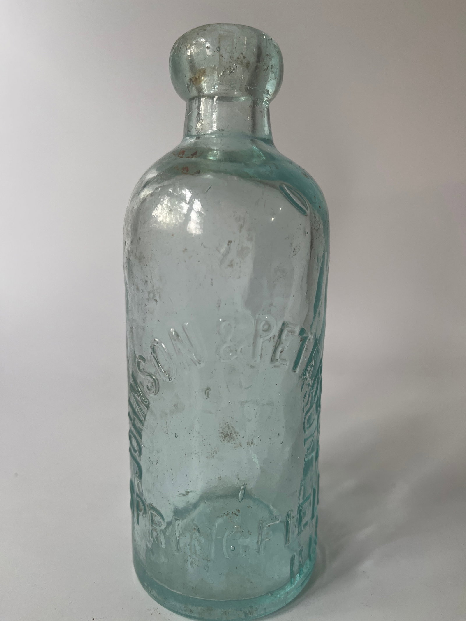 Johnson & Peterson Springfield, Ills aqua hutch soda.: Here is a Johnson & Peterson Springfield, Ills hutch soda. It is aqua in color and has no damage.