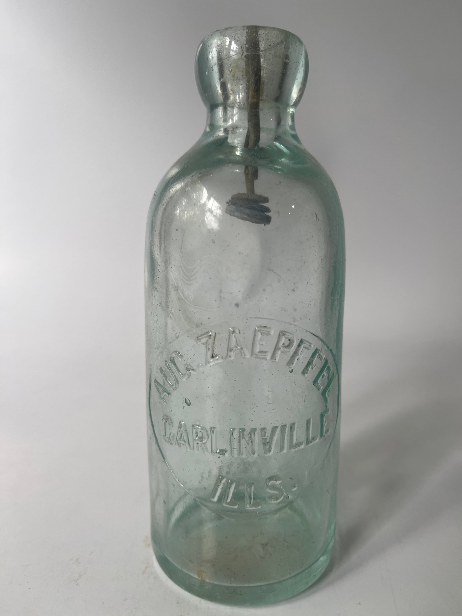 Aug. Zaepffel Carlinville, Ills. aqua hutch soda.: Here's an Aug. Zaepffel Carlinville, Ills hutch soda. The bottle is aqua in color and has no damage. Just a touch of inside stain.