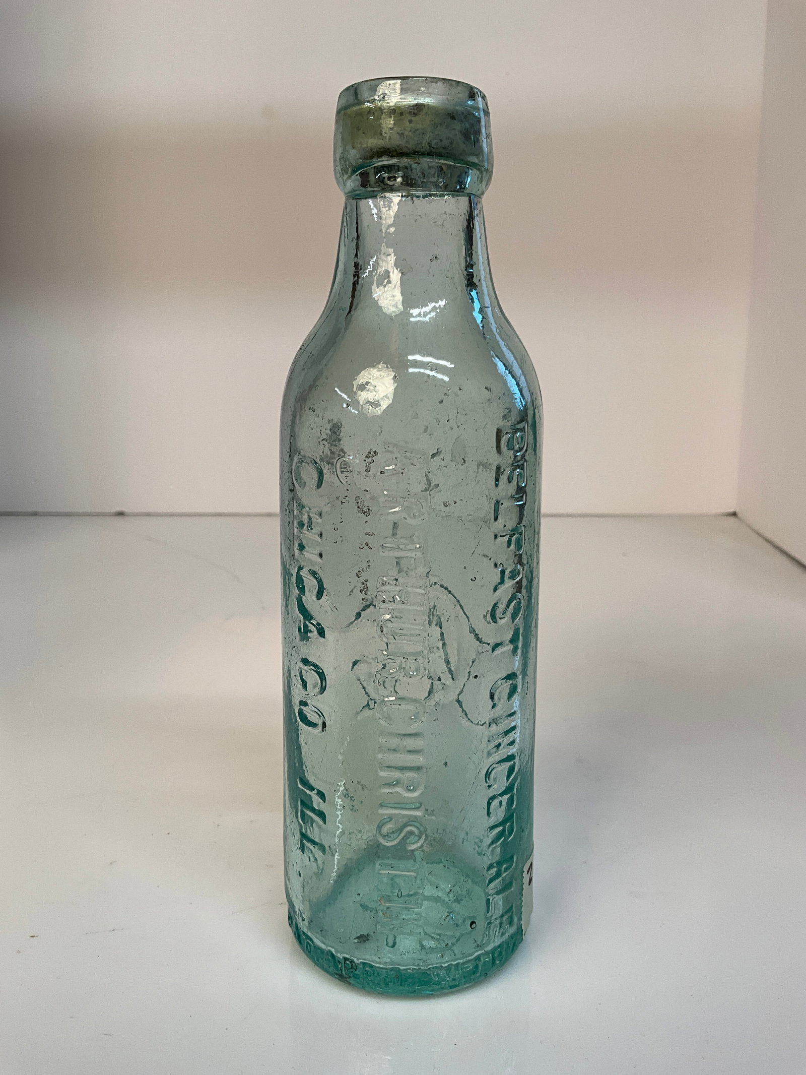 Arthur Christin, Chicago Illinois, Belfast Ginger Ale with Large top: Arthur Christin, Chicago Illinois, Belfast Ginger Ale with Large top and large monogram on the reverse. This is an interesting bottle with that large top. A neat bottle and a conversation starter. Bos