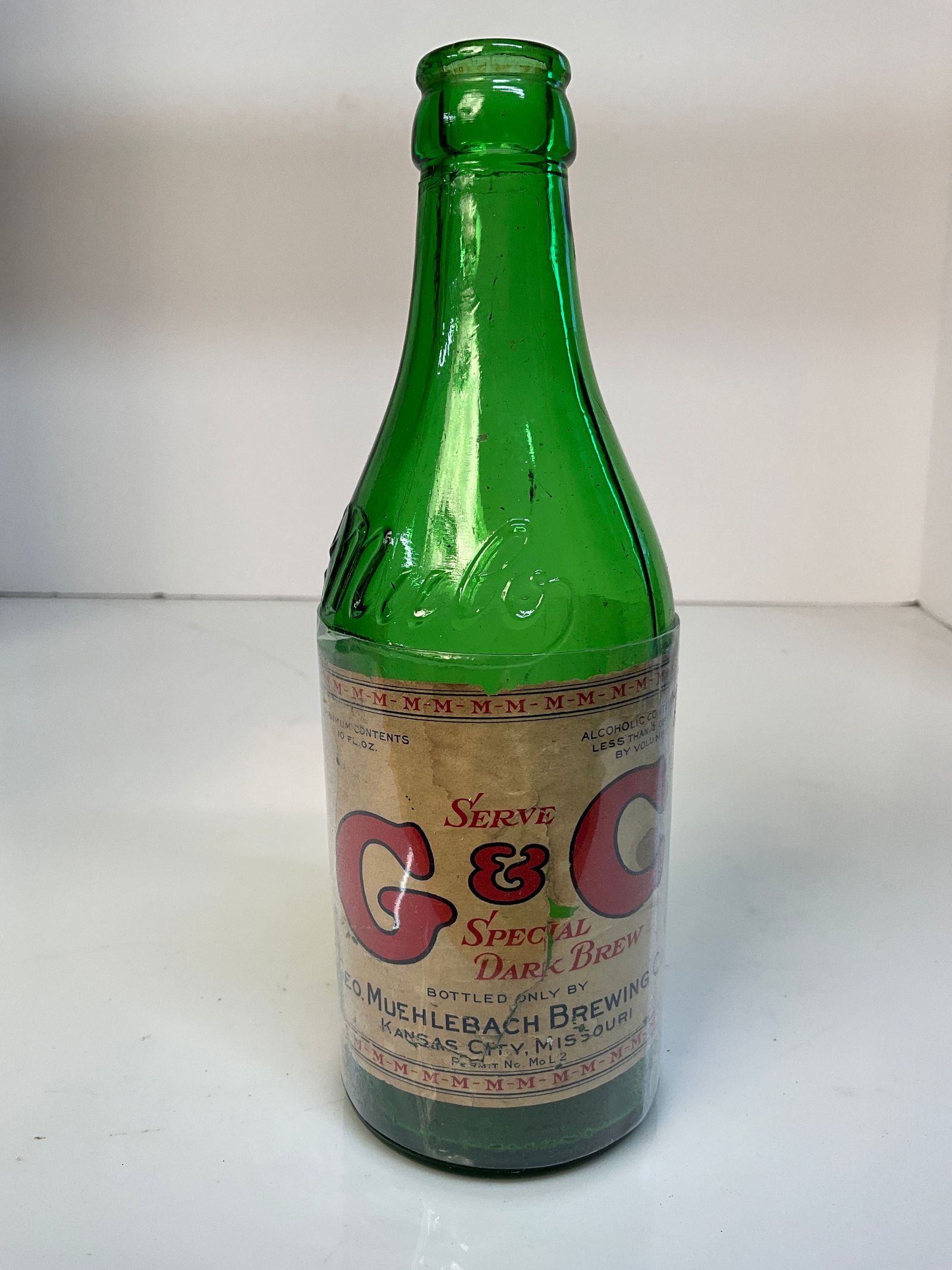 Geo Muehlebach Brewing Co, Green Bottle with Paper Label, Serve G&C Special Dark Brew (1 of 6)