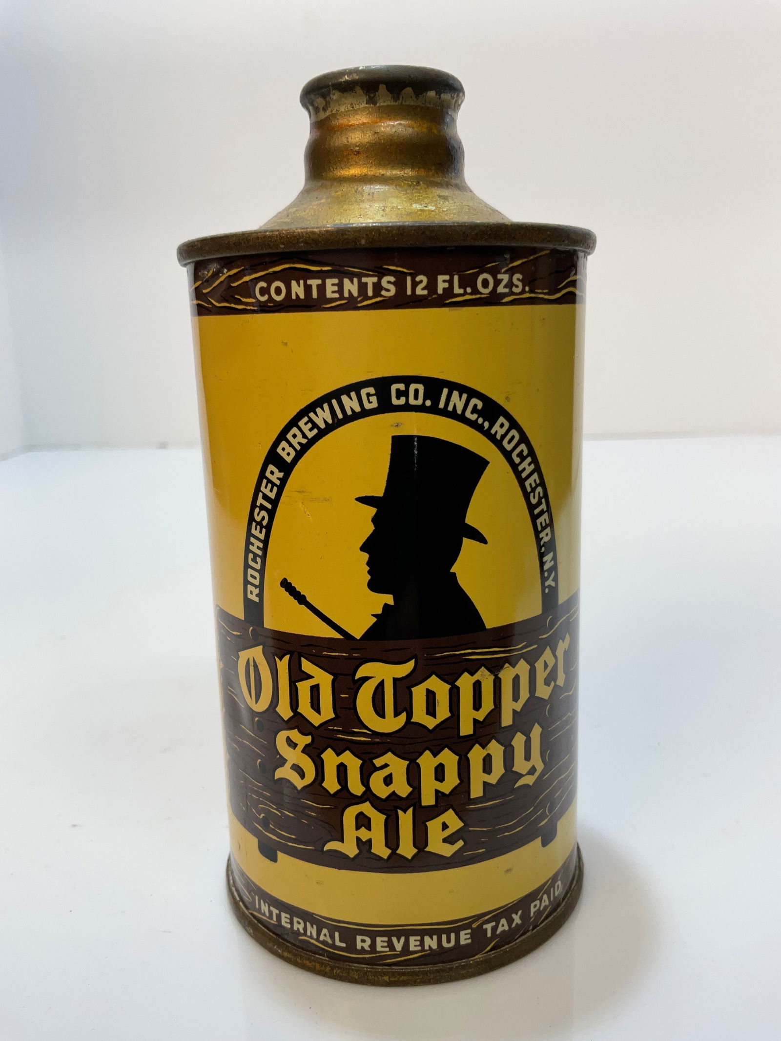 Old Topper Snappy Ale Beer Can, Steel Cone Top Beer Can. Rochester Brewing Co. New York: Old Topper Snappy Ale Beer Can, Steel Cone Top Beer Can. Rochester Brewing Co. New York. A man with a top hat, in yellow, brown and black. No rust on this one.