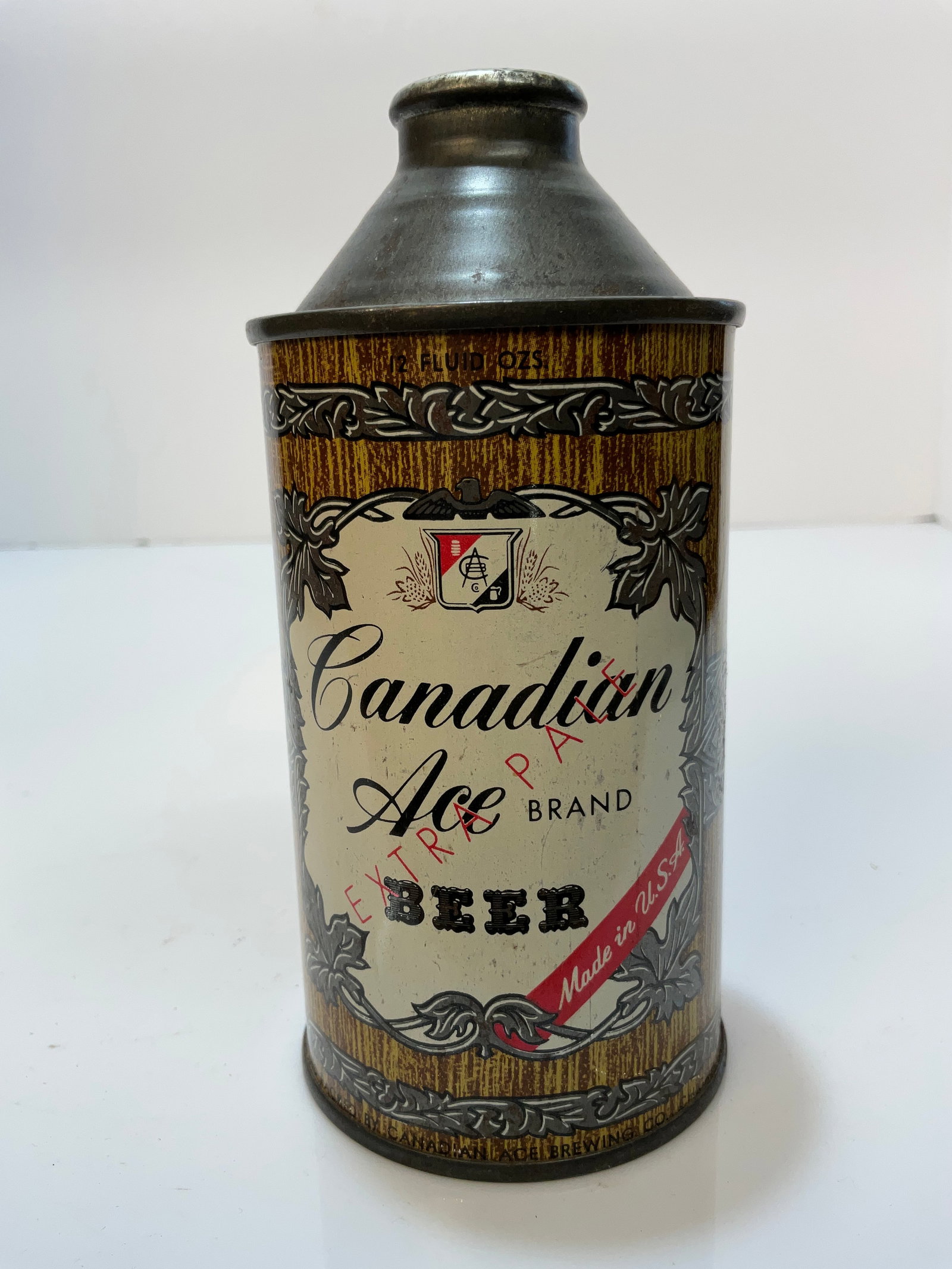 Canadian Ace Brand, Cone Top Beer Can, Extra pale. Repurposed Can from Kalamazoo Michigan: Canadian Ace Brand, Cone Top Beer Can, Extra pale. Repurposed Can from Kalamazoo Michigan. There is a label on the reverse of this can for a company in Kalamazoo Michigan. Seems they used it for flamm