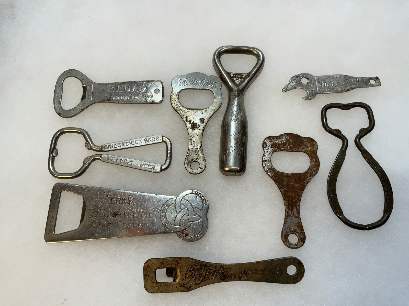 Nine Early Figural Advertising Openers in various shapes (1 of 6)