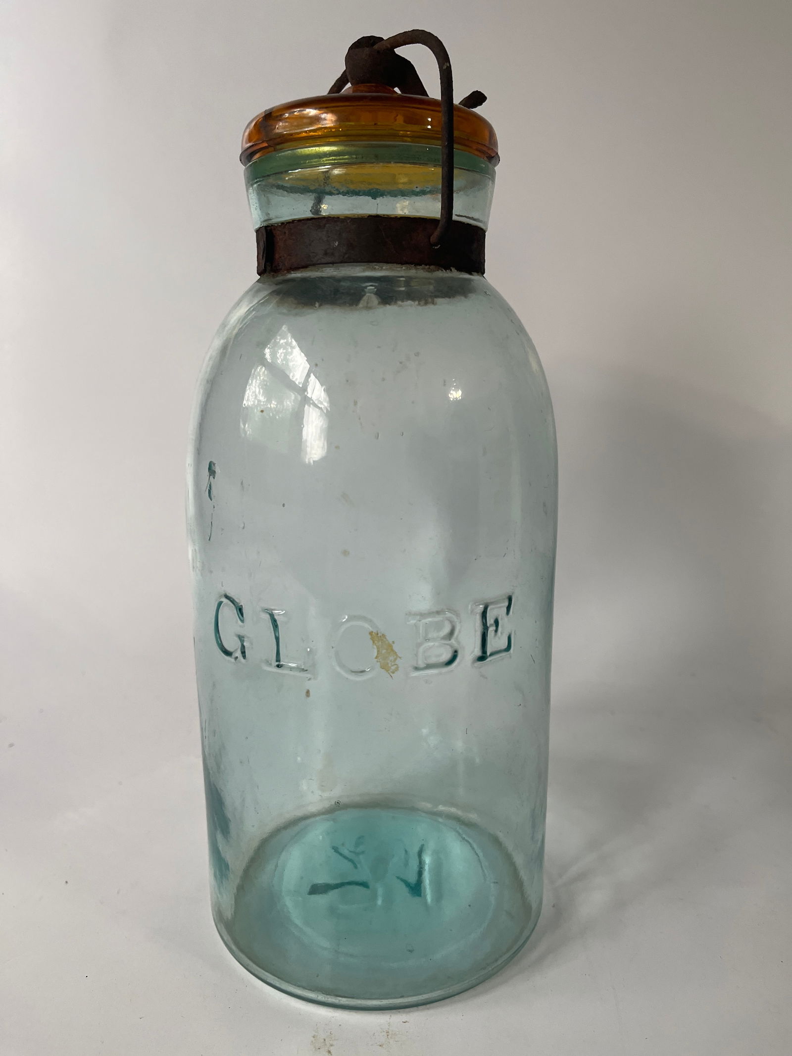 Half gallon Globe Jar, aqua with damaged amber lid. (1 of 5)