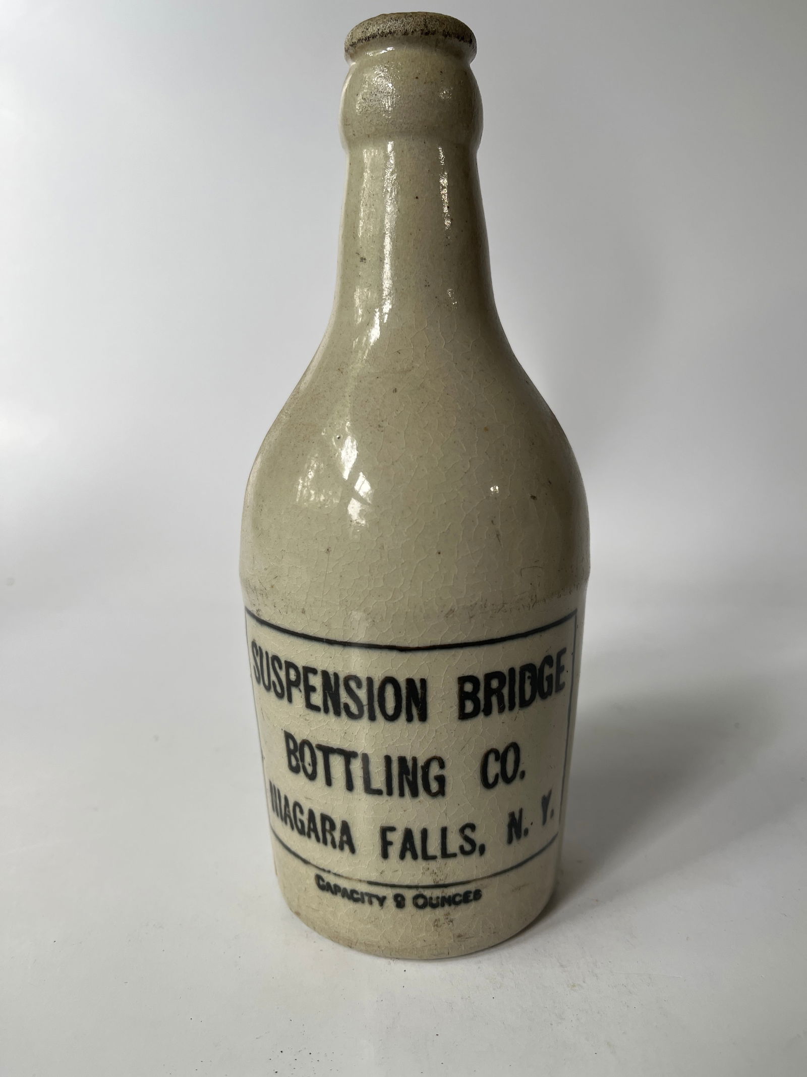 Suspension Bridge Bottling Co. Niagara Falls, NY stoneware bottle. (1 of 4)