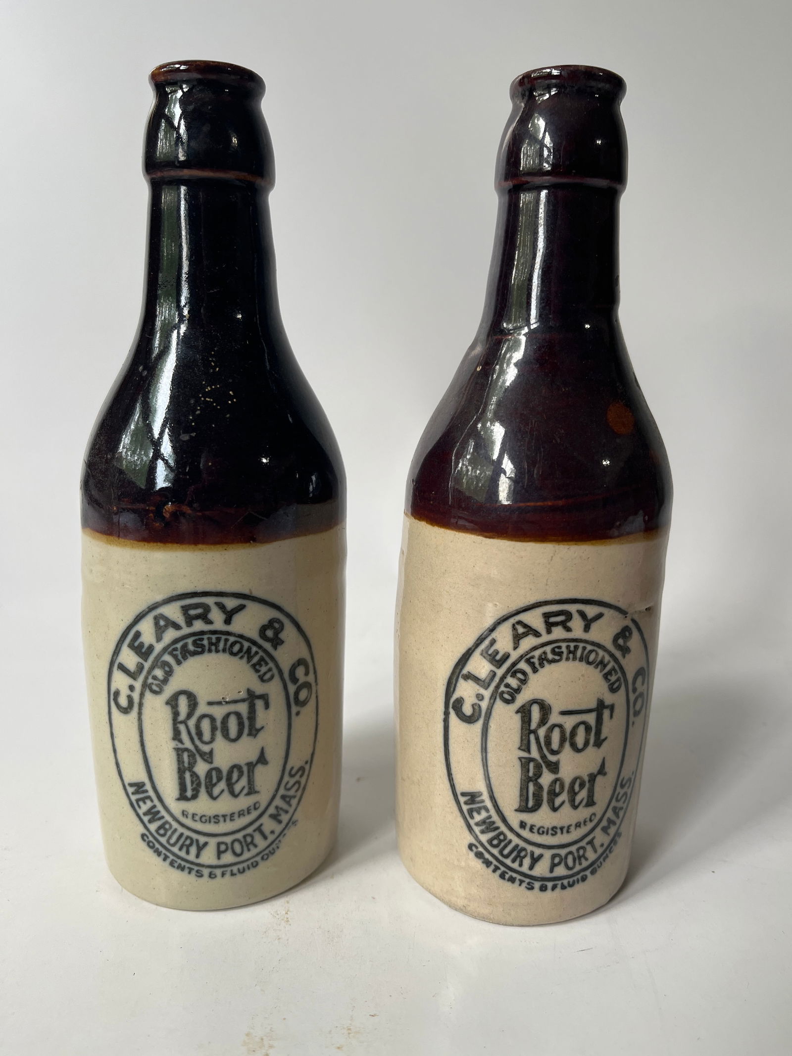 Lot of 2 C. Leary & Co. Root Beer Newbury Port, Mass stoneware bottles. (1 of 4)