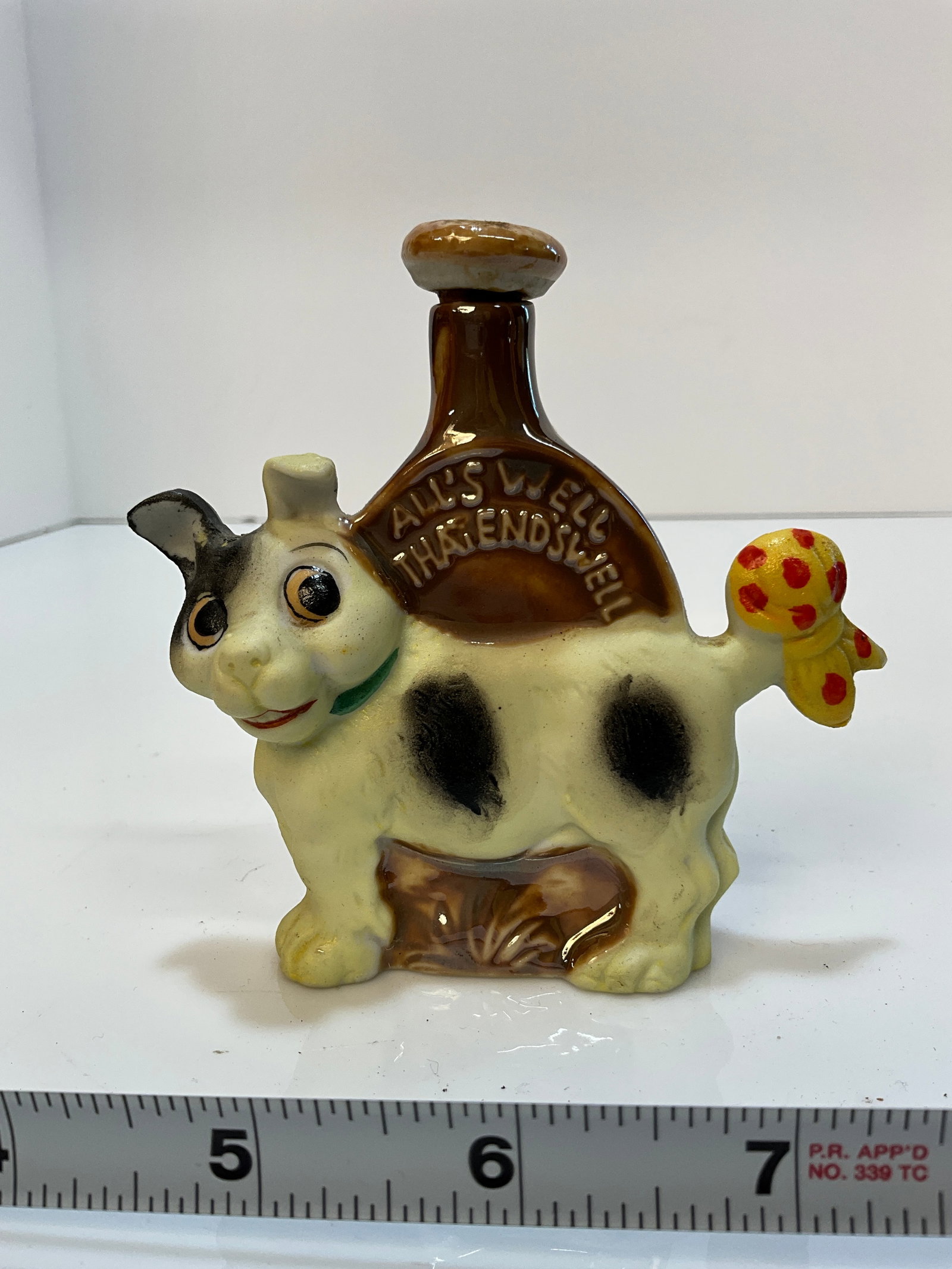 Vintage Whiskey Nip - Dog with Yellow Bowtie on its Tail, Porcelain, All's Well That End's Well: Vintage Whiskey Nip - Dog with Yellow Bowtie on its Tail, Porcelain, All's Well That End's Well, Made in Japan. Original Stopper