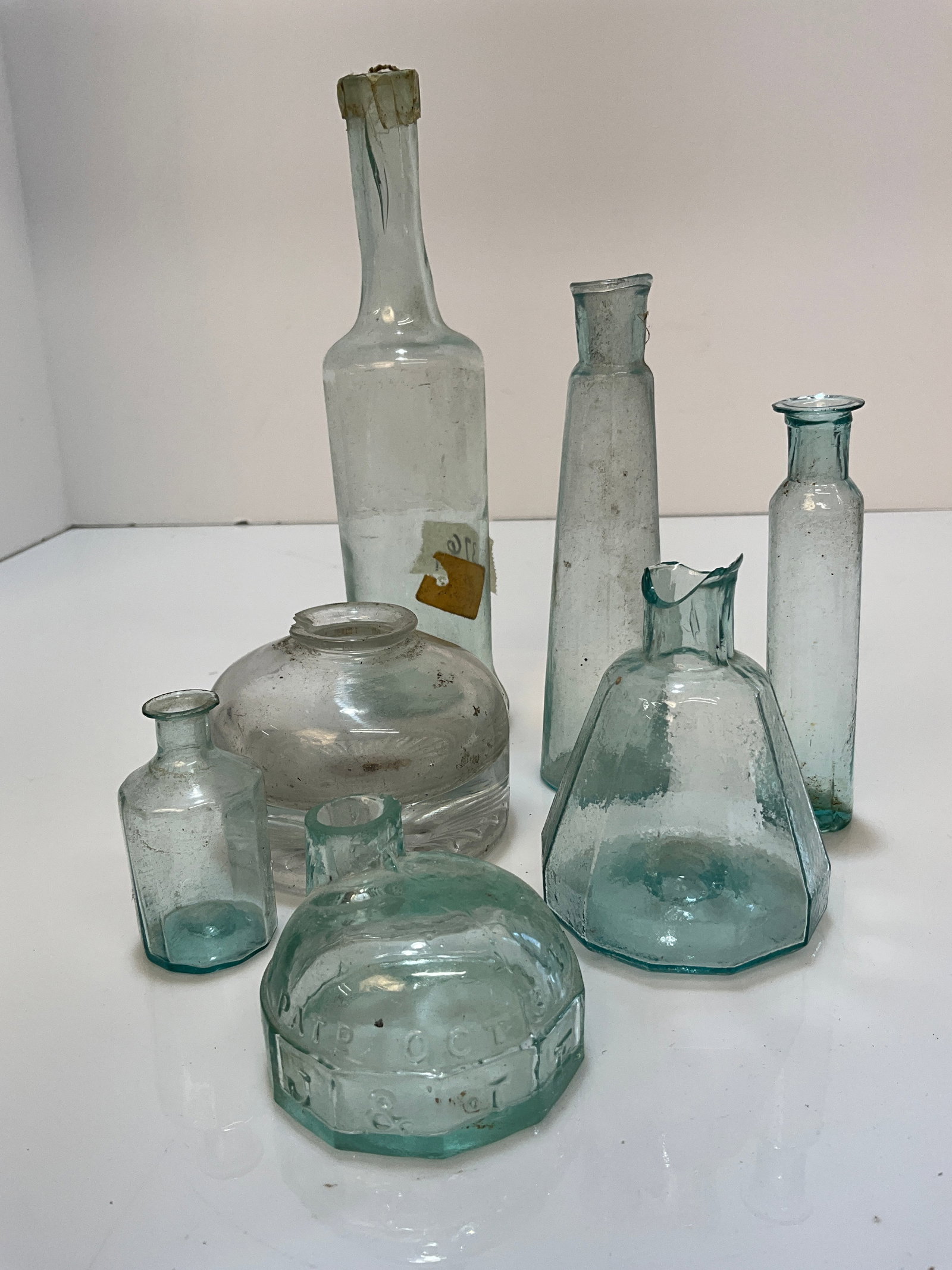 Group of 7 Early Bottles - Pontils, Inks...Etc: Group of 7 Early Bottles - Pontils, Inks...Etc. 3 Pontiled cylinder style bottles, 3 inks, all have damage on the lips and 1 larger smooth base bottle.