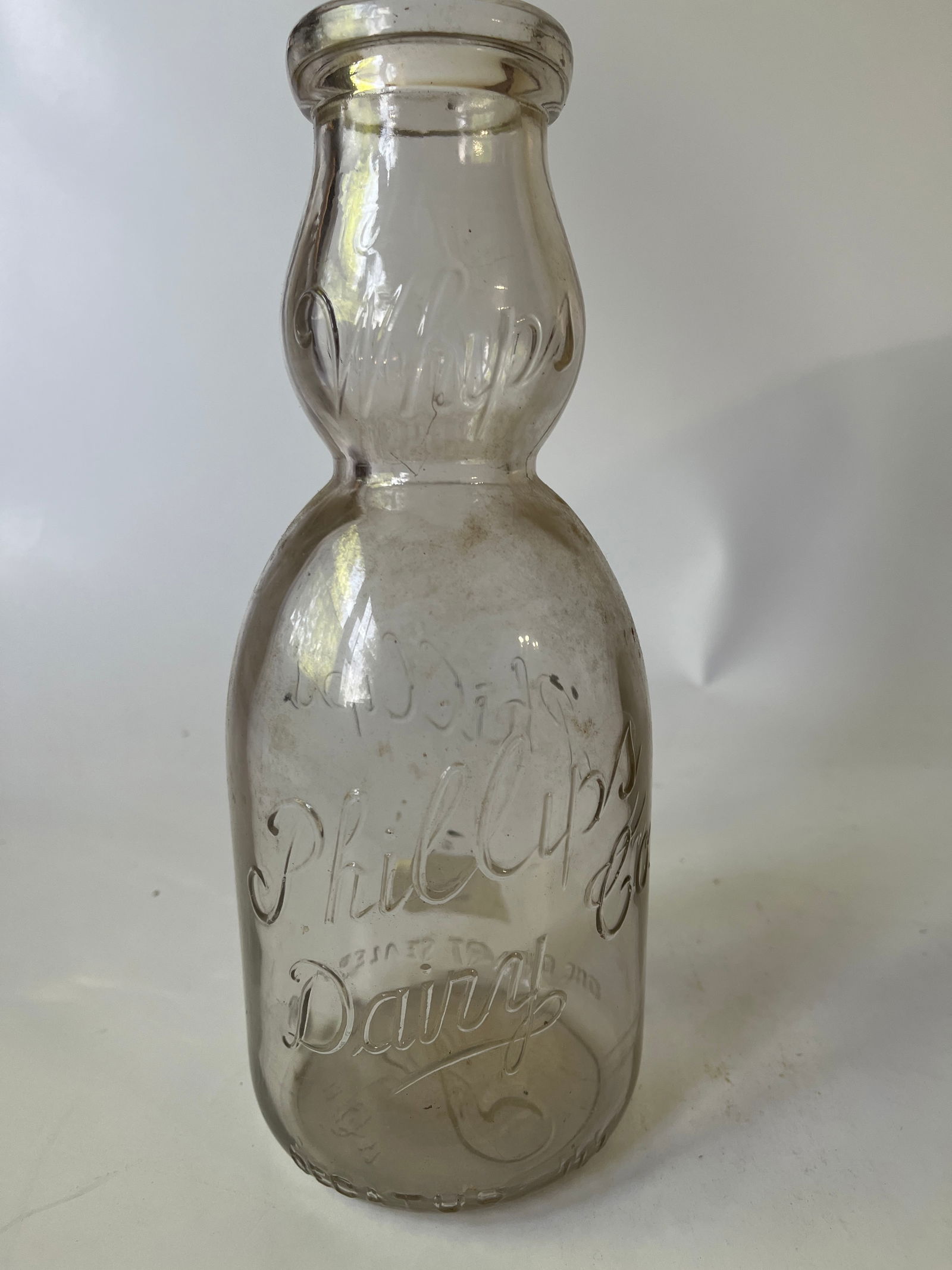 Phillip's Dairy Co. Decatur, Ill. quart embossed cream top milk bottle. (1 of 4)