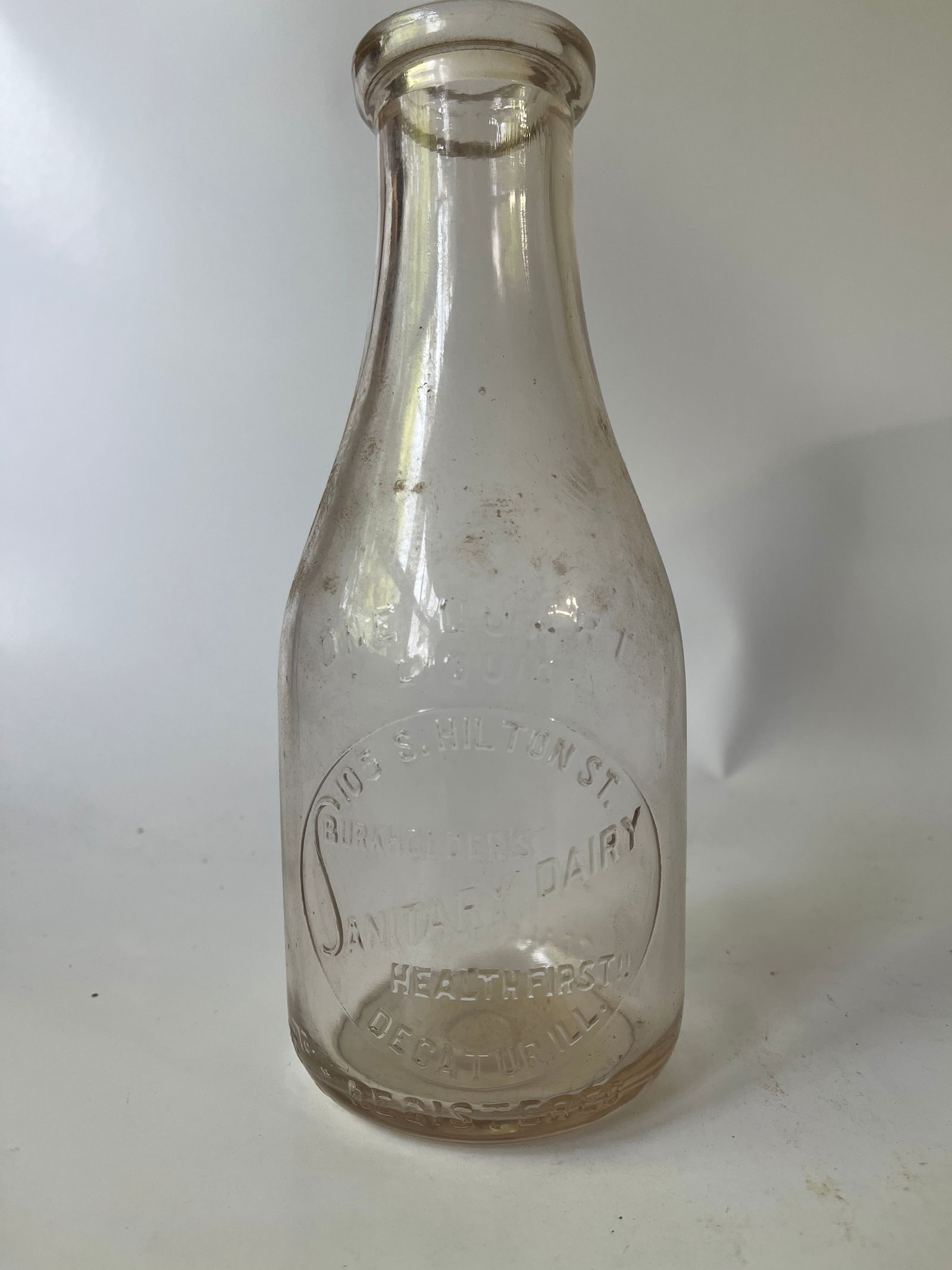 Burkholder's Sanitary Dairy Decatur, Ill embossed quart milk bottle. (1 of 4)