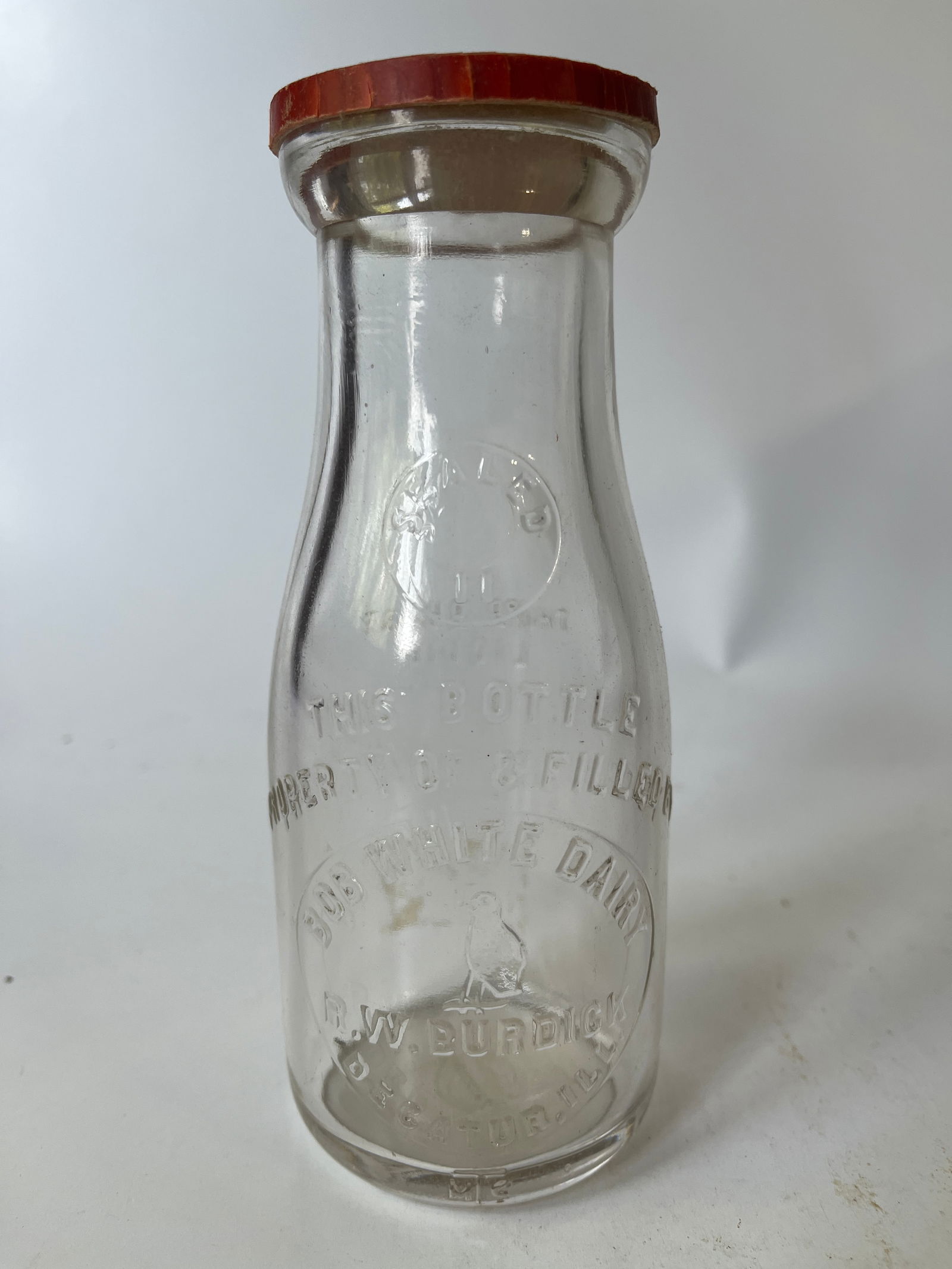 Bob White Dairy B.W. Burdick Decatur, Ill embossed pint milk bottle w/ cap. (1 of 4)