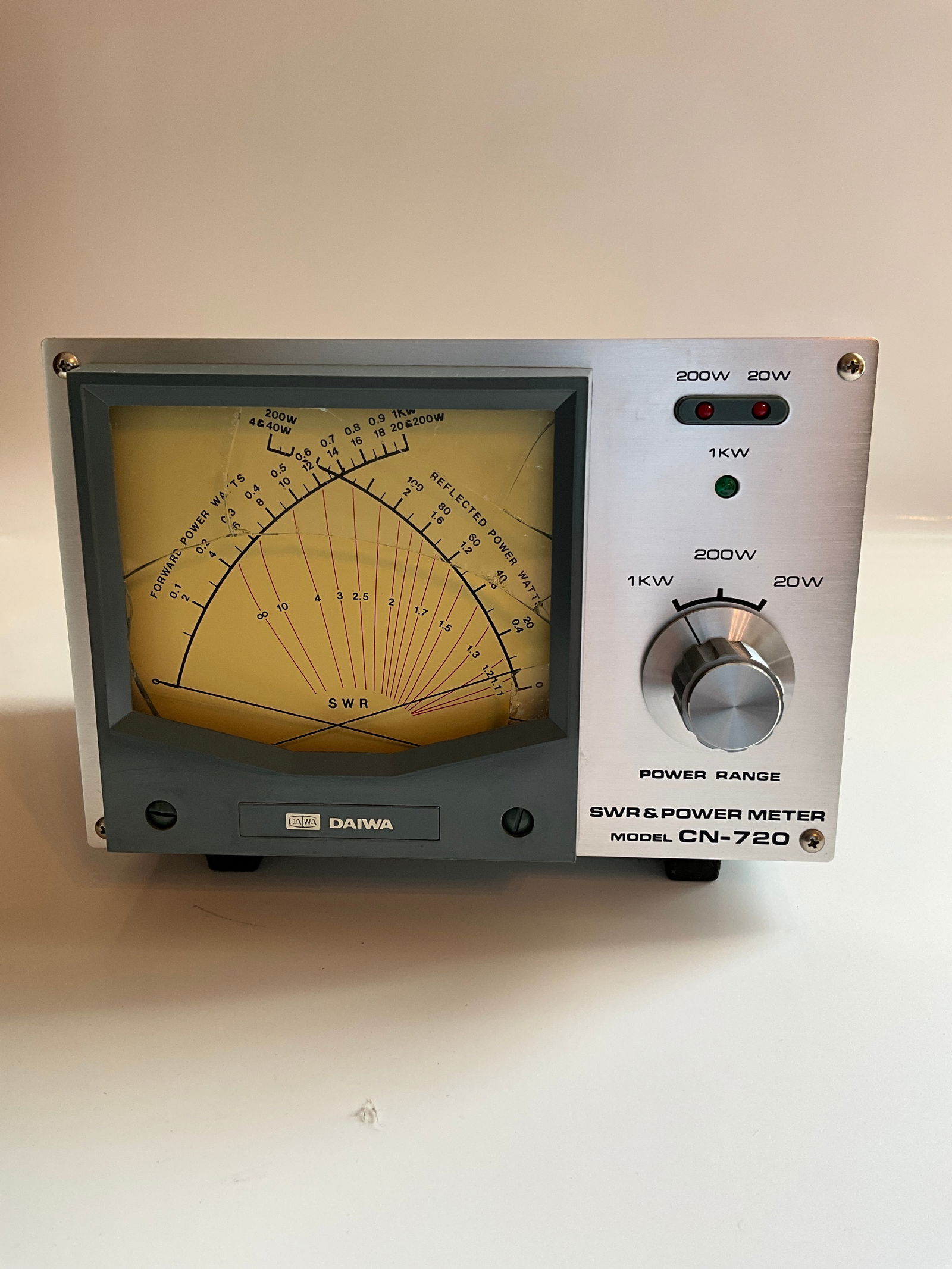 Daiwa CN 720B Peak Reading Watt/SWR Meter.: Daiwa CN 720B Peak Reading Watt/SWR Meter. Item has damage to the plastic lens on the front. I would image it still works or get this one for parts. This item was removed from a non-smoking home, and