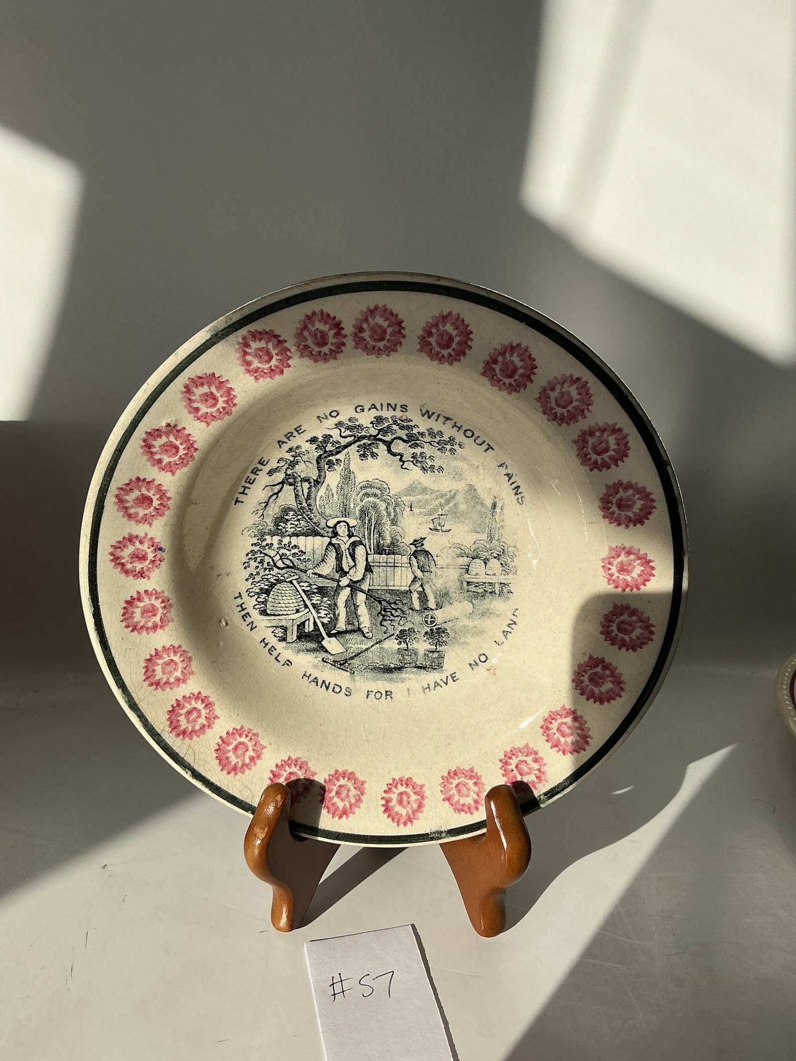 Franklin Maxim Bowl: Unusual 1850s-1860s bowl with two maxims and a workingmans scene. Has a red sponge decorated border. 7" wide and is in good condition.