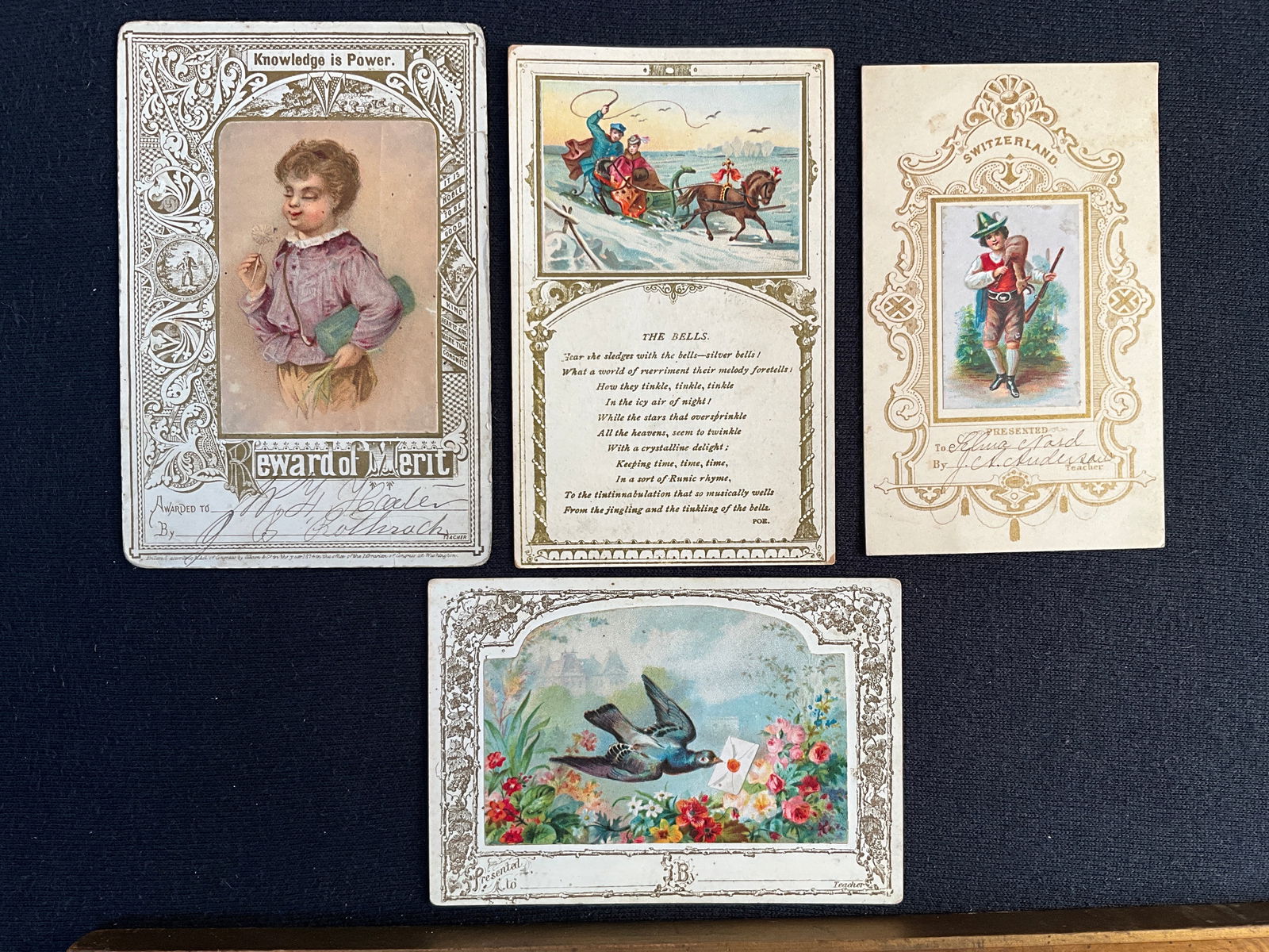 Rewards of Merit, ca. 1874 Lot of 4 - Printed on Heavy Stock with Pasted-On Chromos: These four rewards are printed in gold on heavy card stock and have pasted -on chromos. The one with the little boy was printed by Gibson & Co. 1874. This card has crimped corners; the rest are in goo