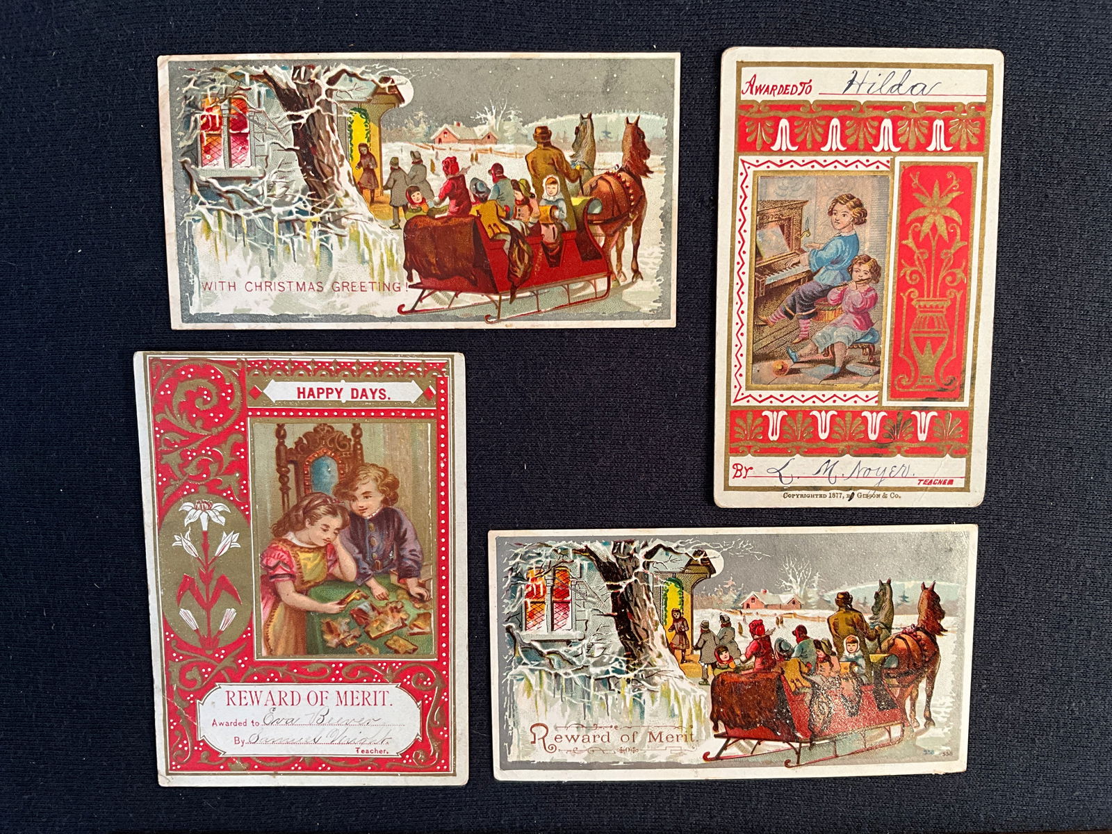 Rewards of Merit, ca. 1870s Lot of 4 - Children Playing and Winter Themed Merits: Two cards in this lot feature Chromos of children playing at home (one by Gibson & co. 1877). The other two have the identical winter scene with sleigh, but while one is labeled a reward of merit, its