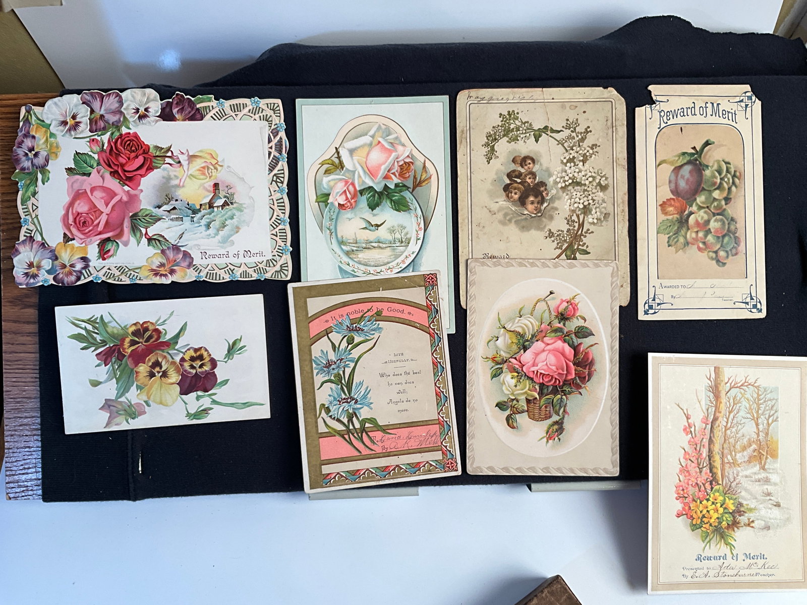 Rewards of Merit, ca. 1890s Lot of 8 - Depicting Flowers and Fruits: This group of 1890s cards depicts flowers and fruit. Every card has a presentation inscription, on front or reverse. Largest card is 5 ½” X 7 ½”. Condition ranges from very g