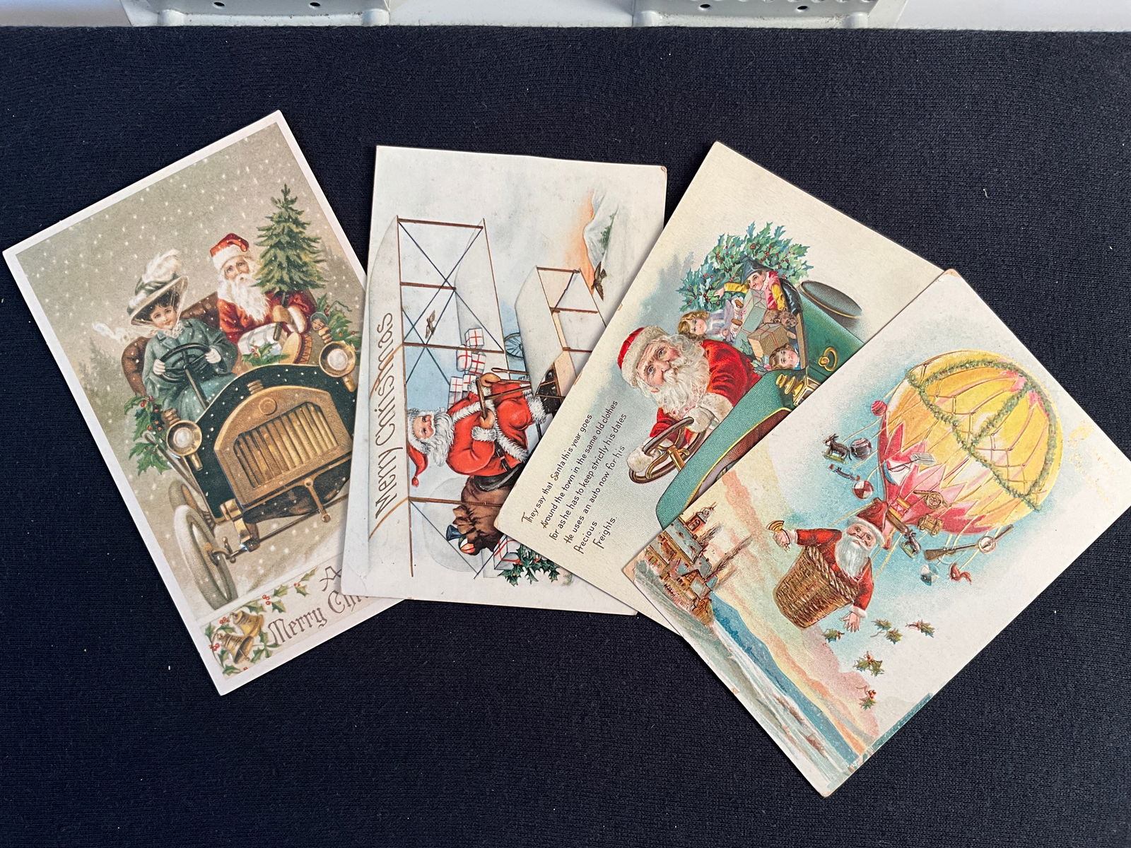 Post Cards, 190, Lot of 4 - Santa and transportation (Auto, bi-plane, and balloon) (1 of 5)