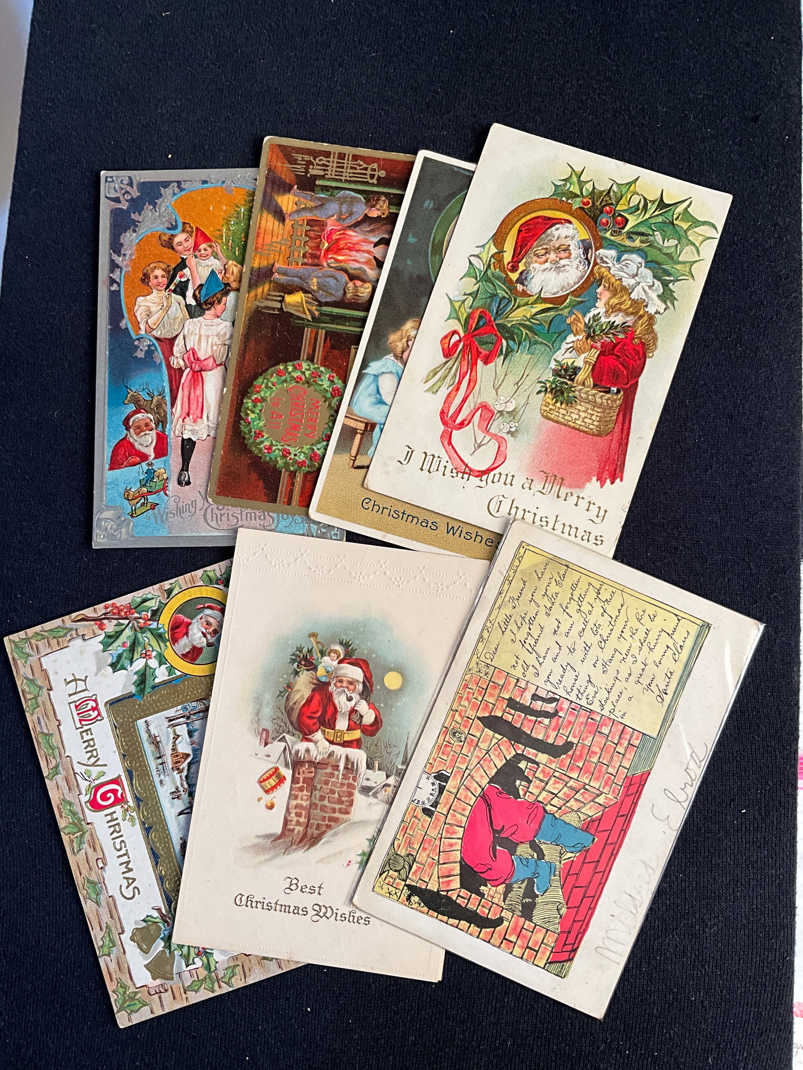 Post Cards, 1900-1915, Santa Claus in understated Fashion - 8 Cards: 8 cards in which Santa Clause in depicted in understated fashion. Postmarked are 1909 and 1913. All in good condition.