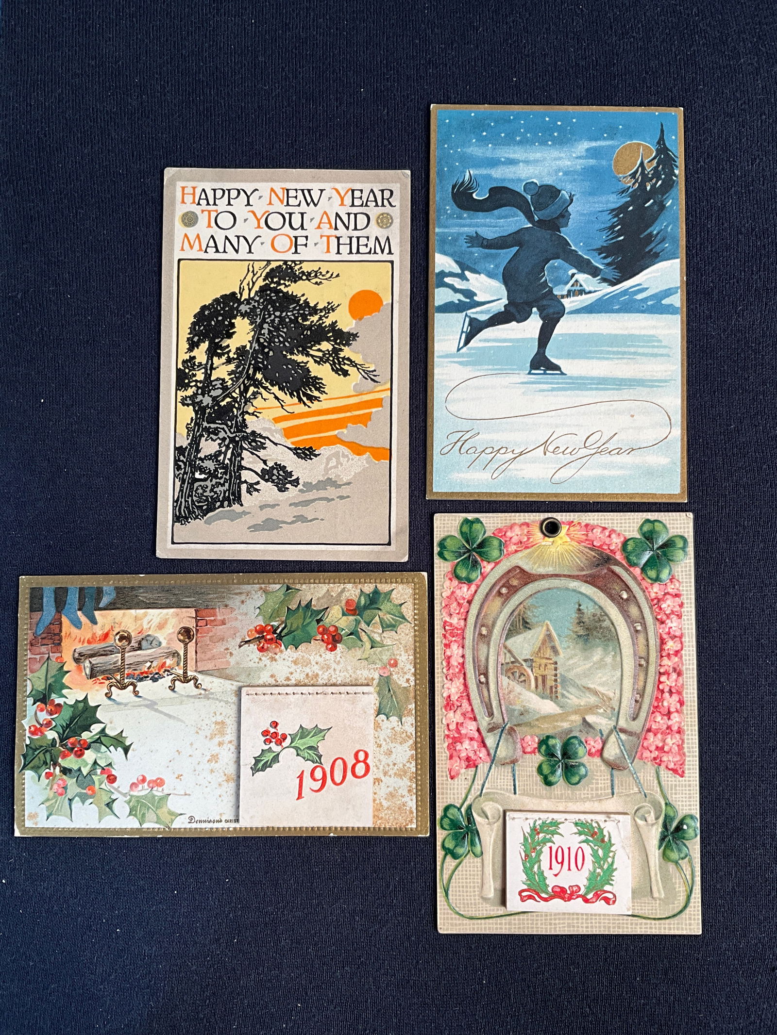 Post Cards, 1908-1910, Lot of 4 - New Years Post Cards: Four New Years Day cards, being two with intact 1908 and 1910 calendars and two art- publisher cards (Fairman Co. and Gibson Art Co.) Good condition but 1908 card has foxing, Fairman Co. card has corn