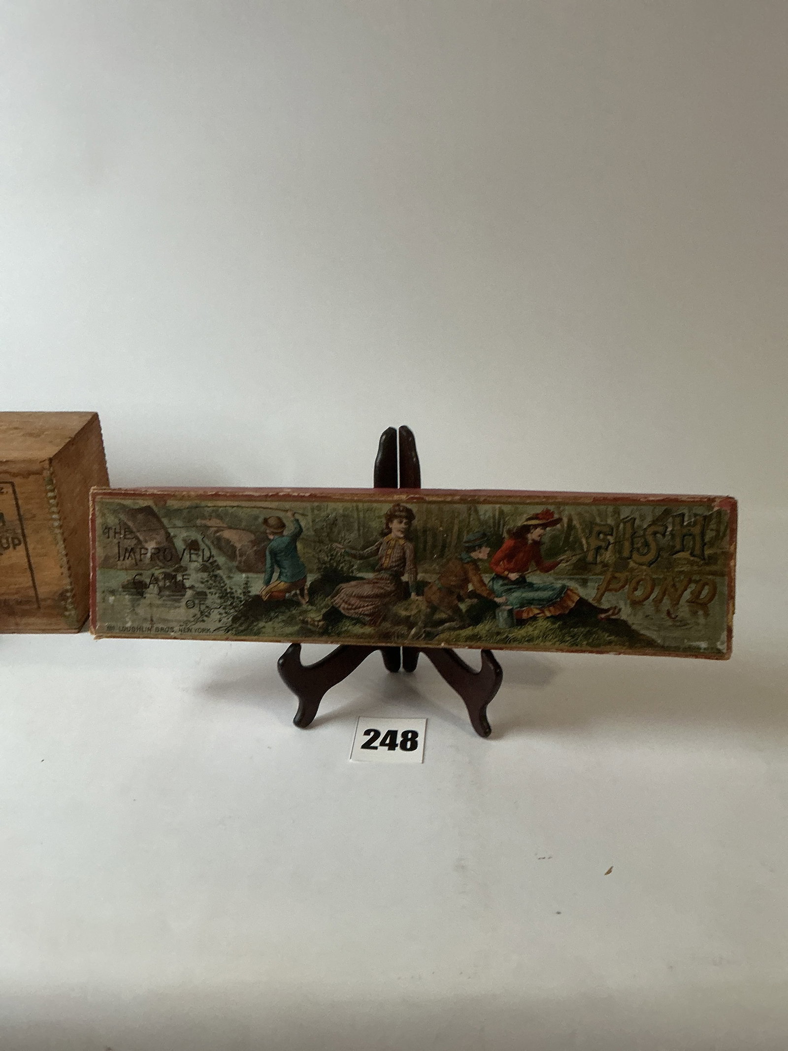 The Improved Game of Fish Pond by McLoughlin Bros. ca.1890.: Here's another great fishing game from the 1890s. It's The Improved Game of Fish Pond. This early game appears to be complete and is in great condition. Super graphics.