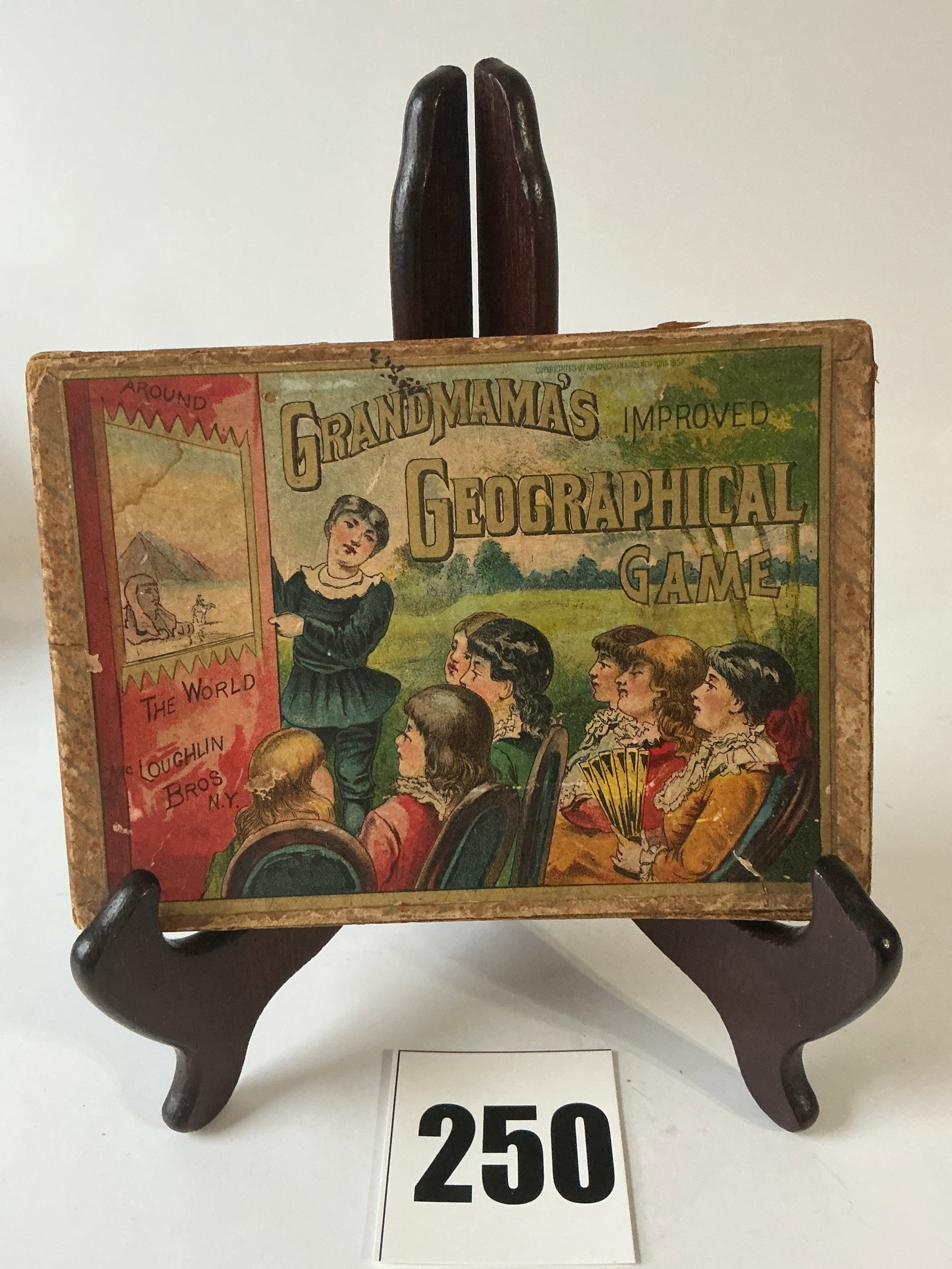 Grandma's Geographical Game by McLoughlin Bros.: Next is a Grandma's Geographical Game put out by the McLoughlin Bros. The game appears to be complete and is in great condition. Again, wonderful graphics.