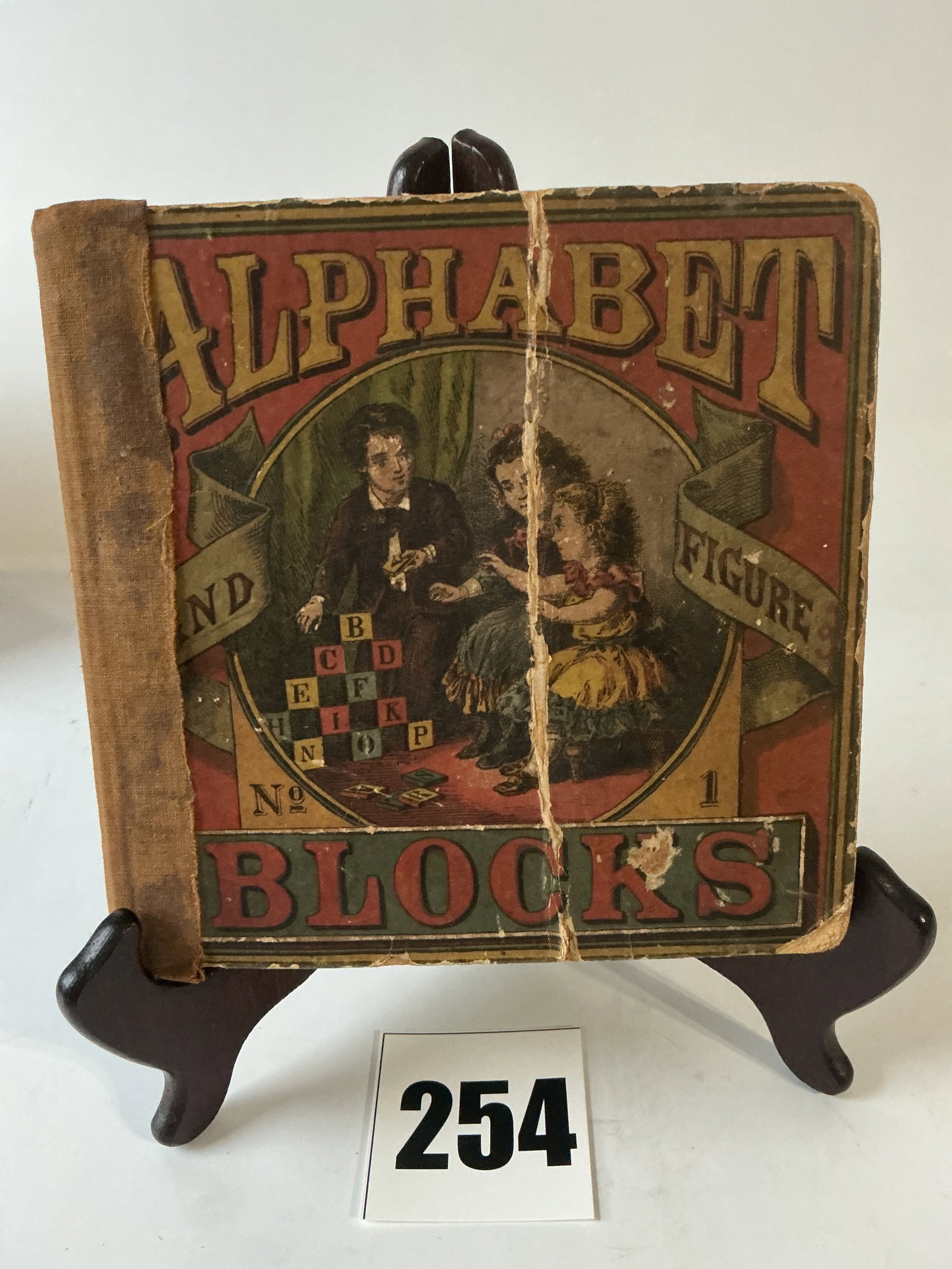 Alphaet and Figure Blocks: Here's a nice set of blocks in the original box. The box is dovetailed and opens like a book. The set appears to be complete and in good condition. This is an early set.