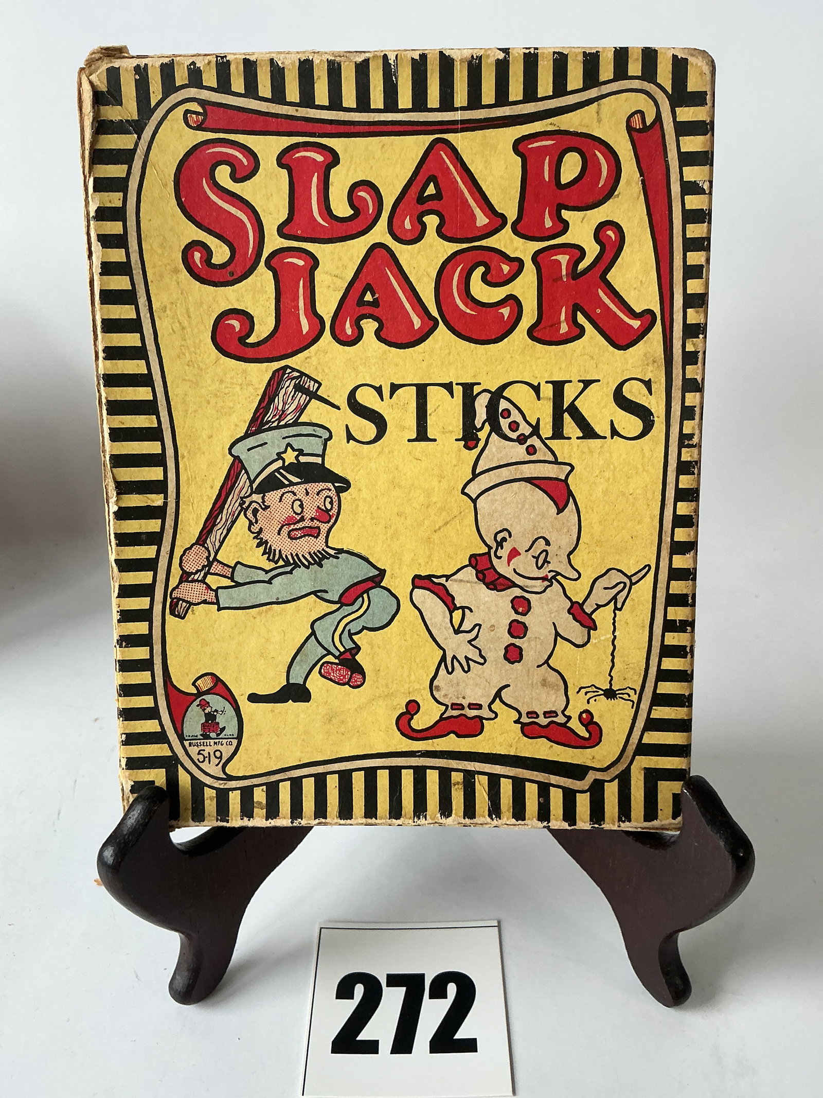 Slap Jack Sticks game by Russell Manufacturing: Here's a game of straws but this one is called Slap Jack Sticks. The game appears to be complete and is in great condition. Interesting graphics.