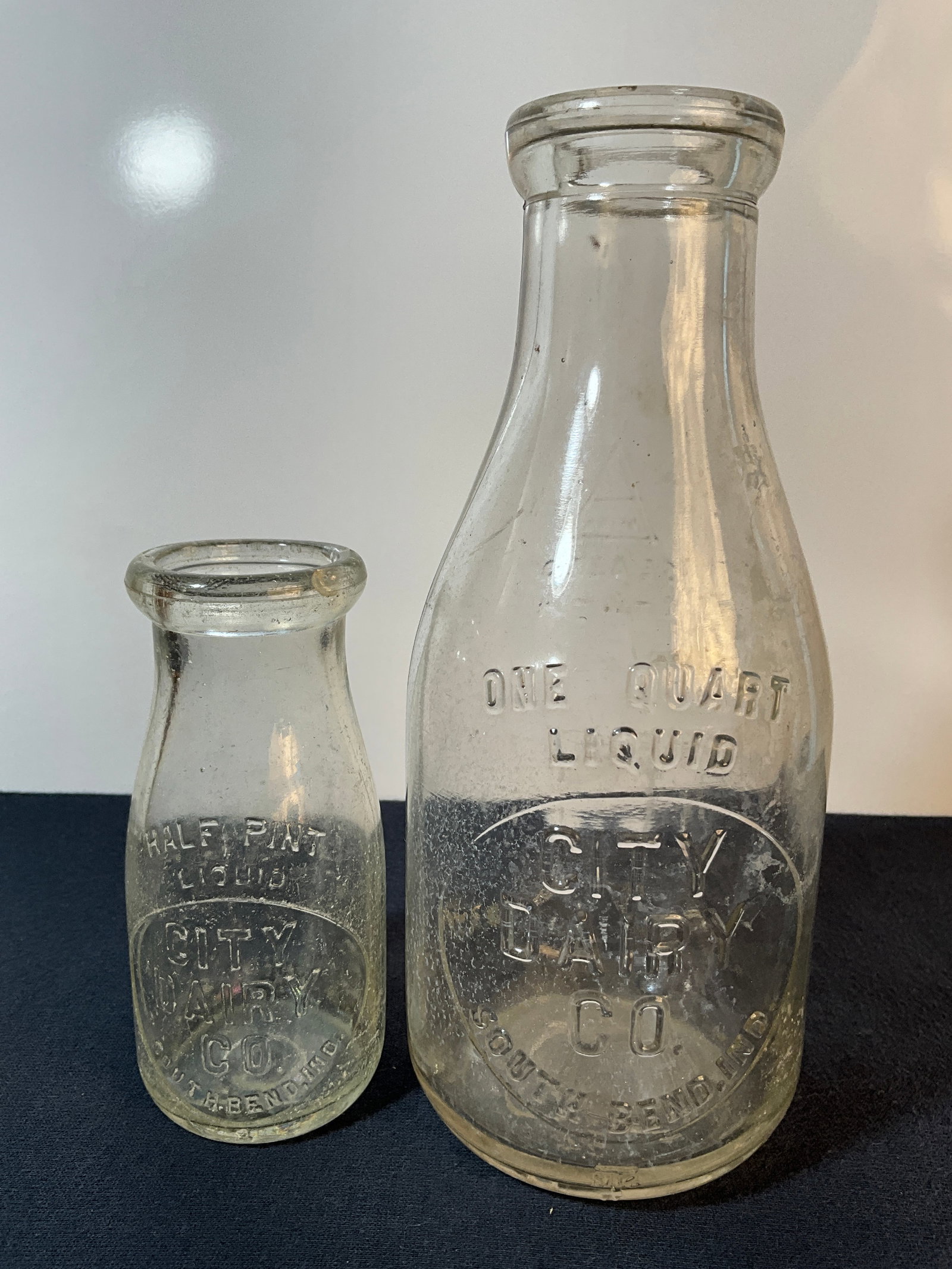 Two Milk Bottles, Embossed City Dairy Co., South Bend Ind. Quart and Pint Milk Bottles (1 of 8)