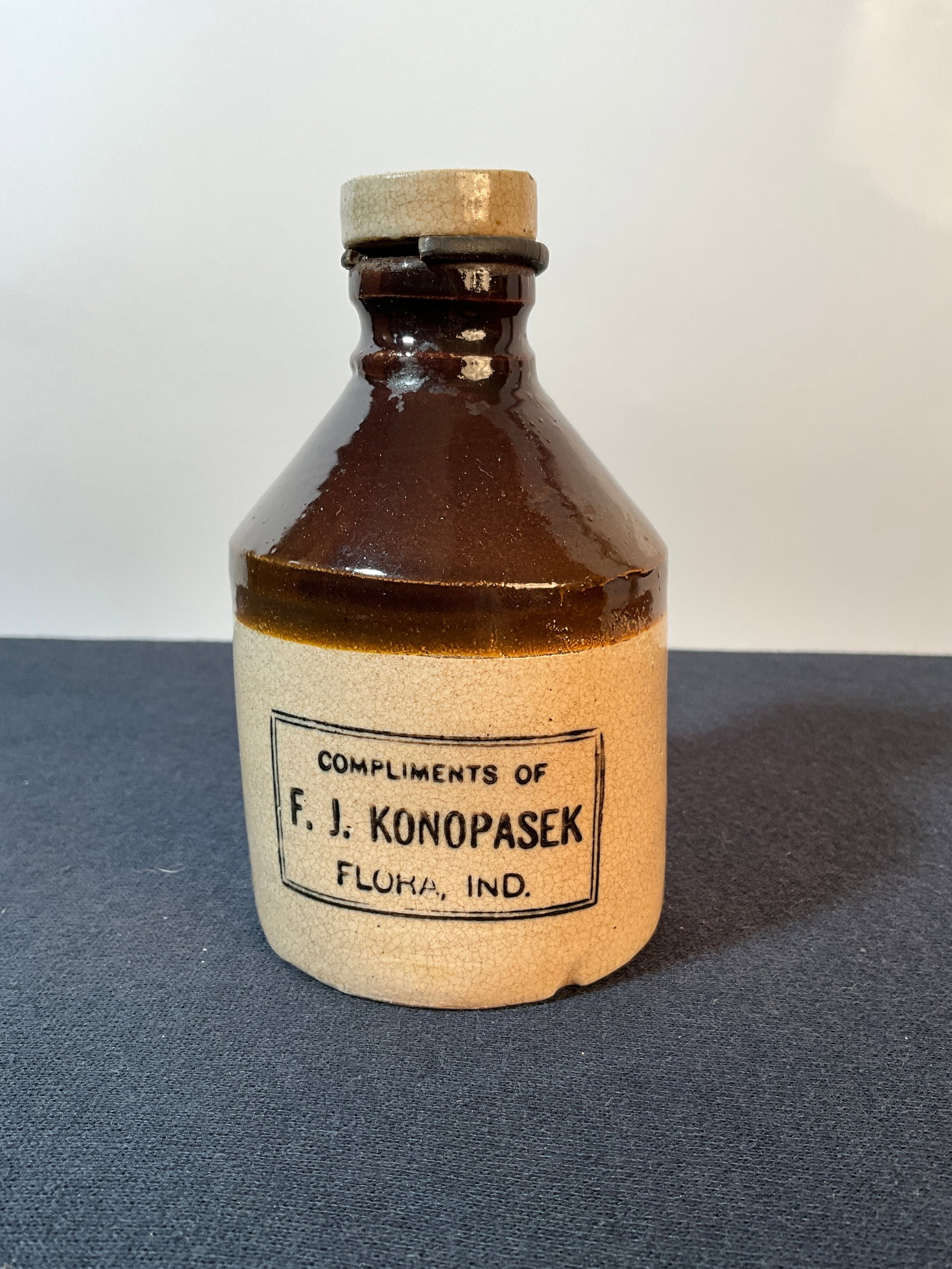 Indiana Miniature Black Stenciled Stoneware "Compliments of F.J. Konopasek, Flora Ind" (1 of 9)