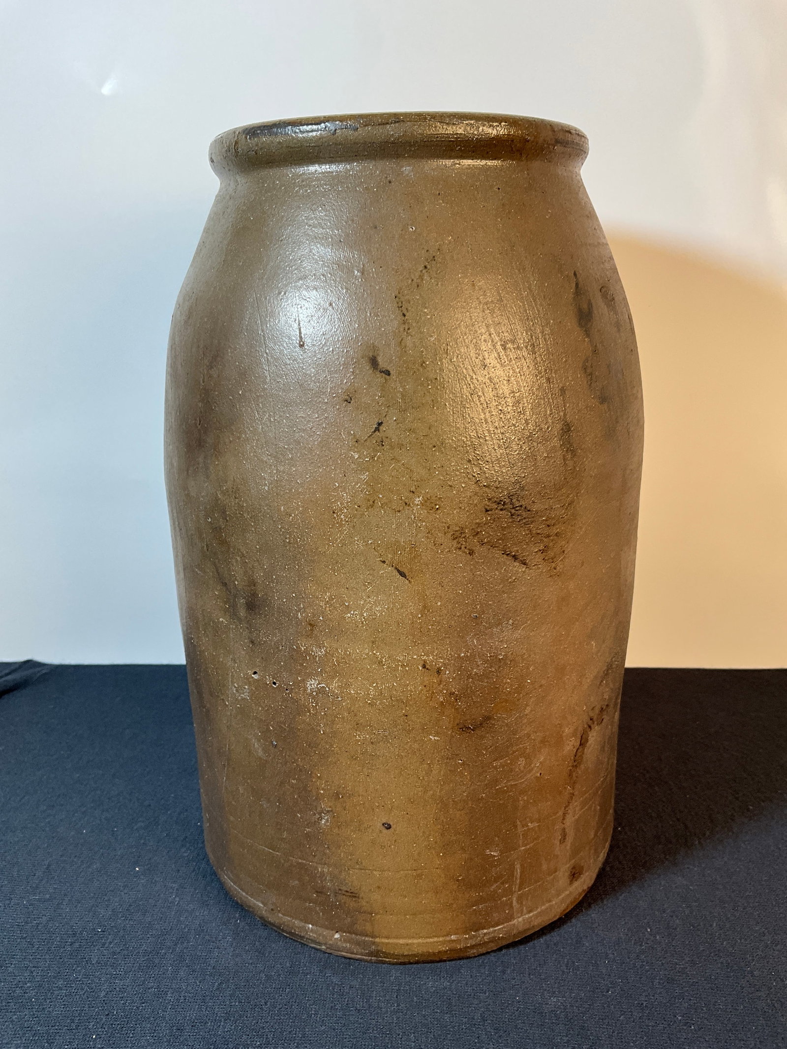 Grey-Green Salt Glaze Stoneware Wax Sealer - Larger Size: Here is a Grey-Green Salt Glaze Stoneware Wax Sealer. An early food container for those storing food throughout the winter. A nice item with minimal wear, some small open bubbles.