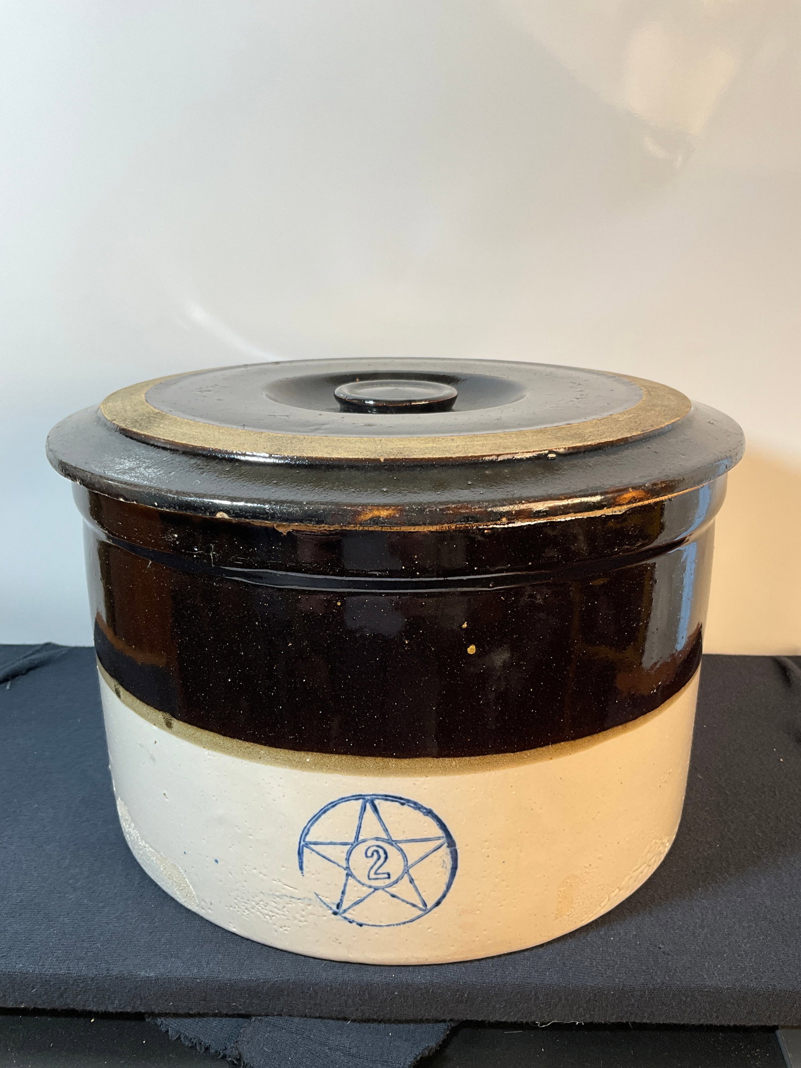 Star Stoneware 2 Gallon 2-tone Crock, with Lid: Here is a Stenciled cobalt Star and 2 Gallon Mark in a circle. A 2-tone Crock, with Lid -(Lid Married to the crock - not original to the crock) The lid is a slightly darker Brown coloration. No damage